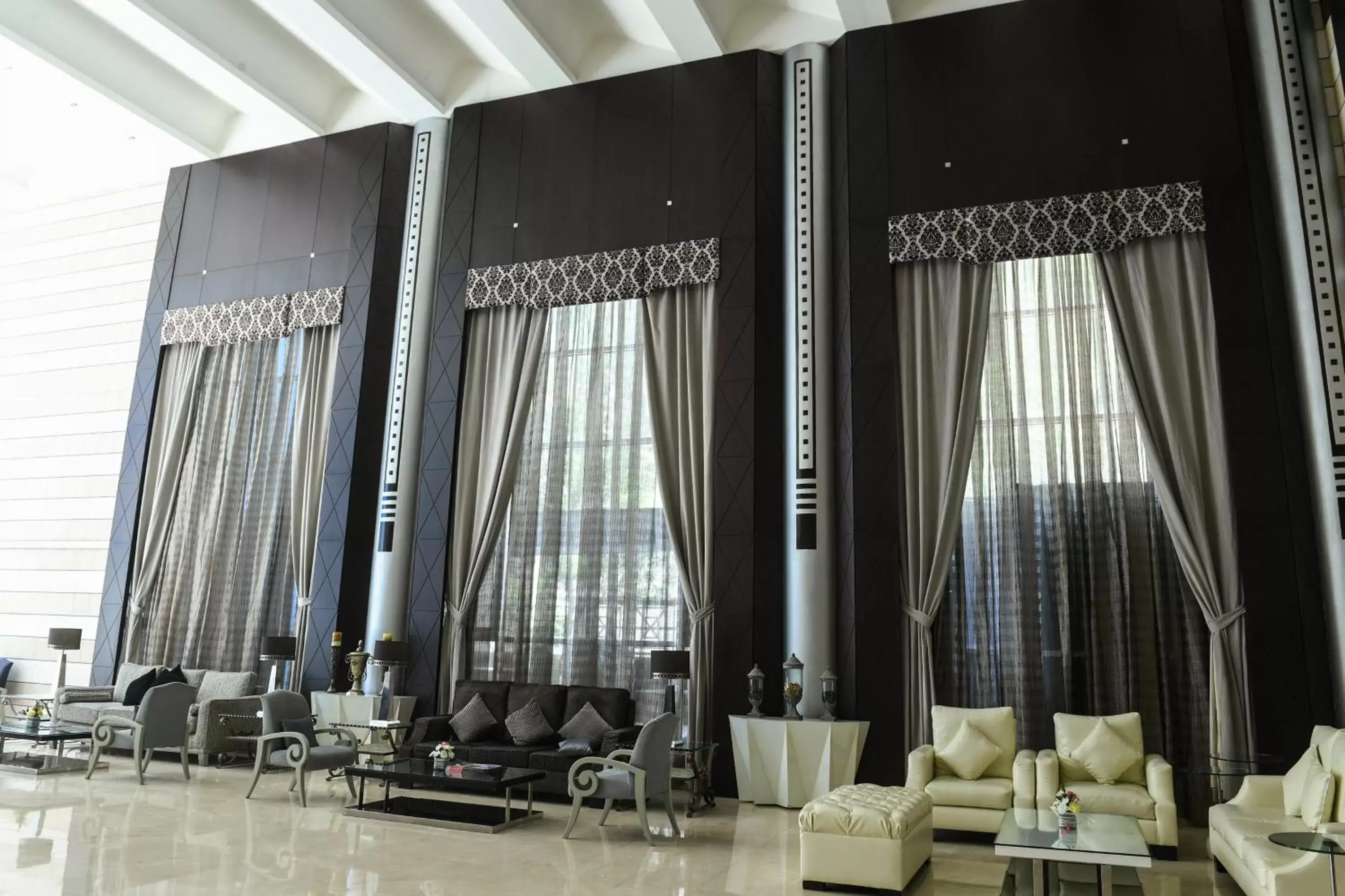 Lobby or reception, Restaurant/Places to Eat in The Juffair Grand Hotel