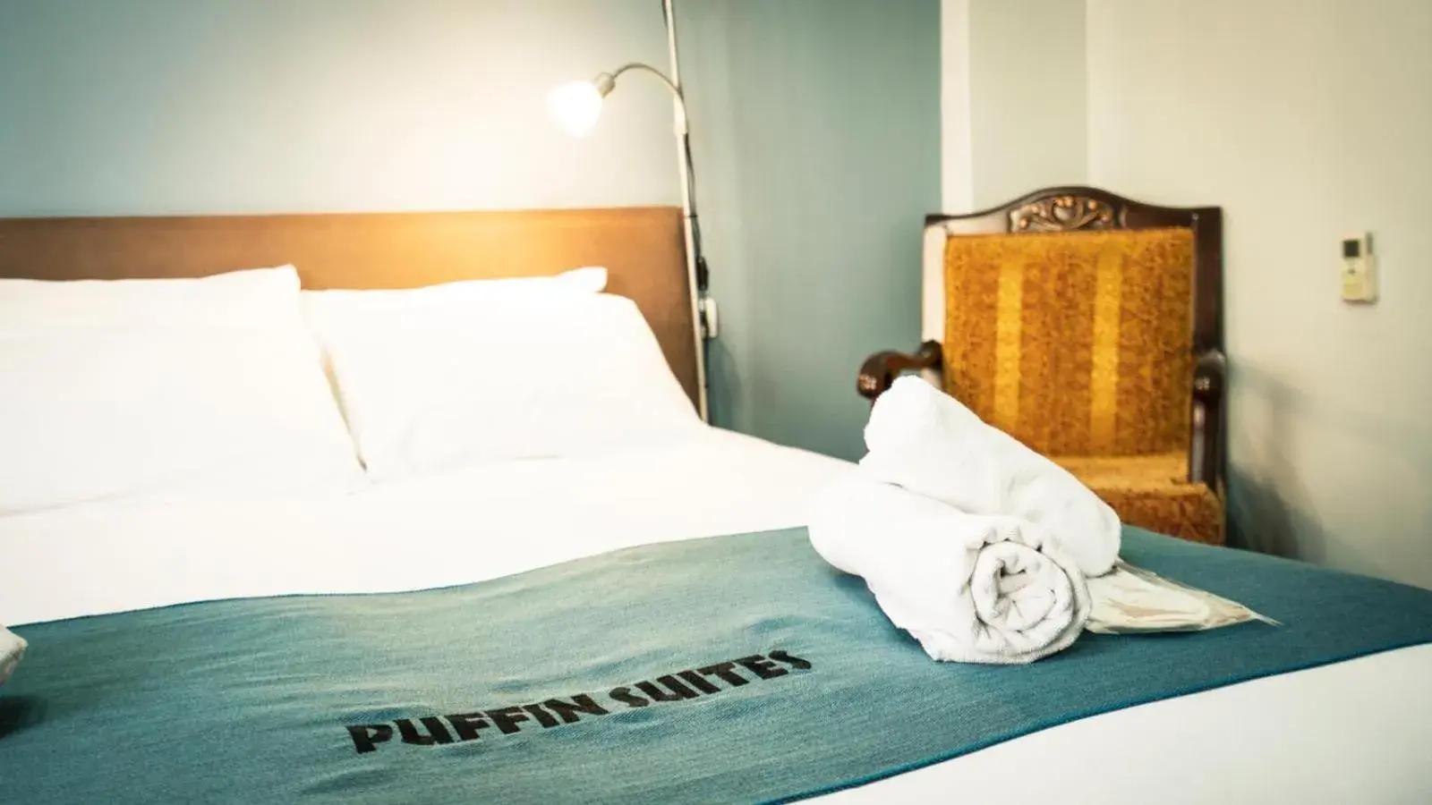 Bed in Puffin Suites