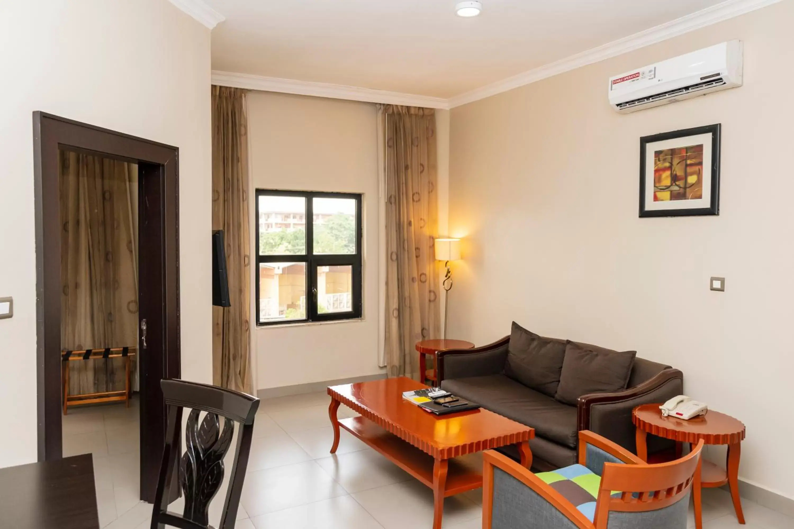 Living room, Seating Area in Hawthorn Suites by Wyndham Abuja