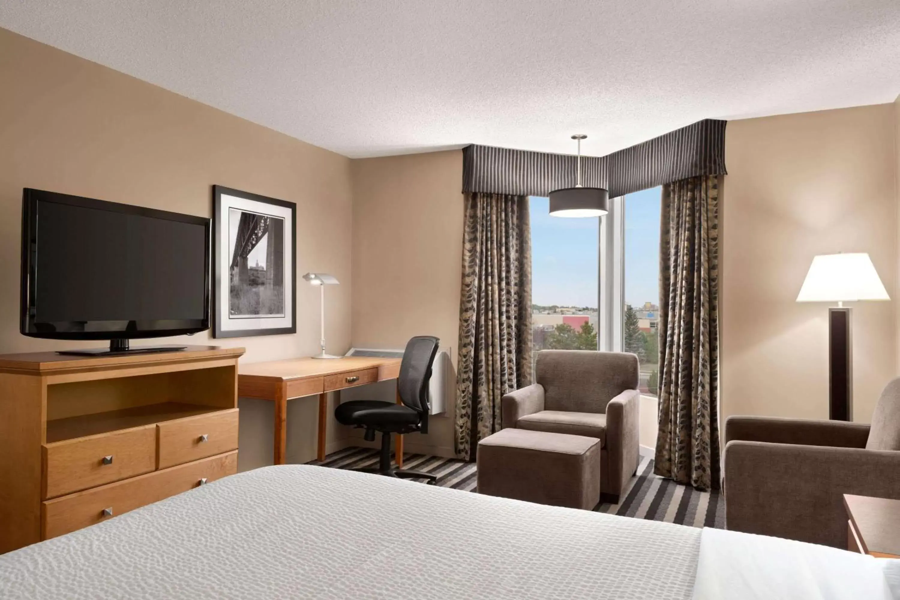 Photo of the whole room, TV/Entertainment Center in Royal Hotel West Edmonton, Trademark Collection by Wyndham