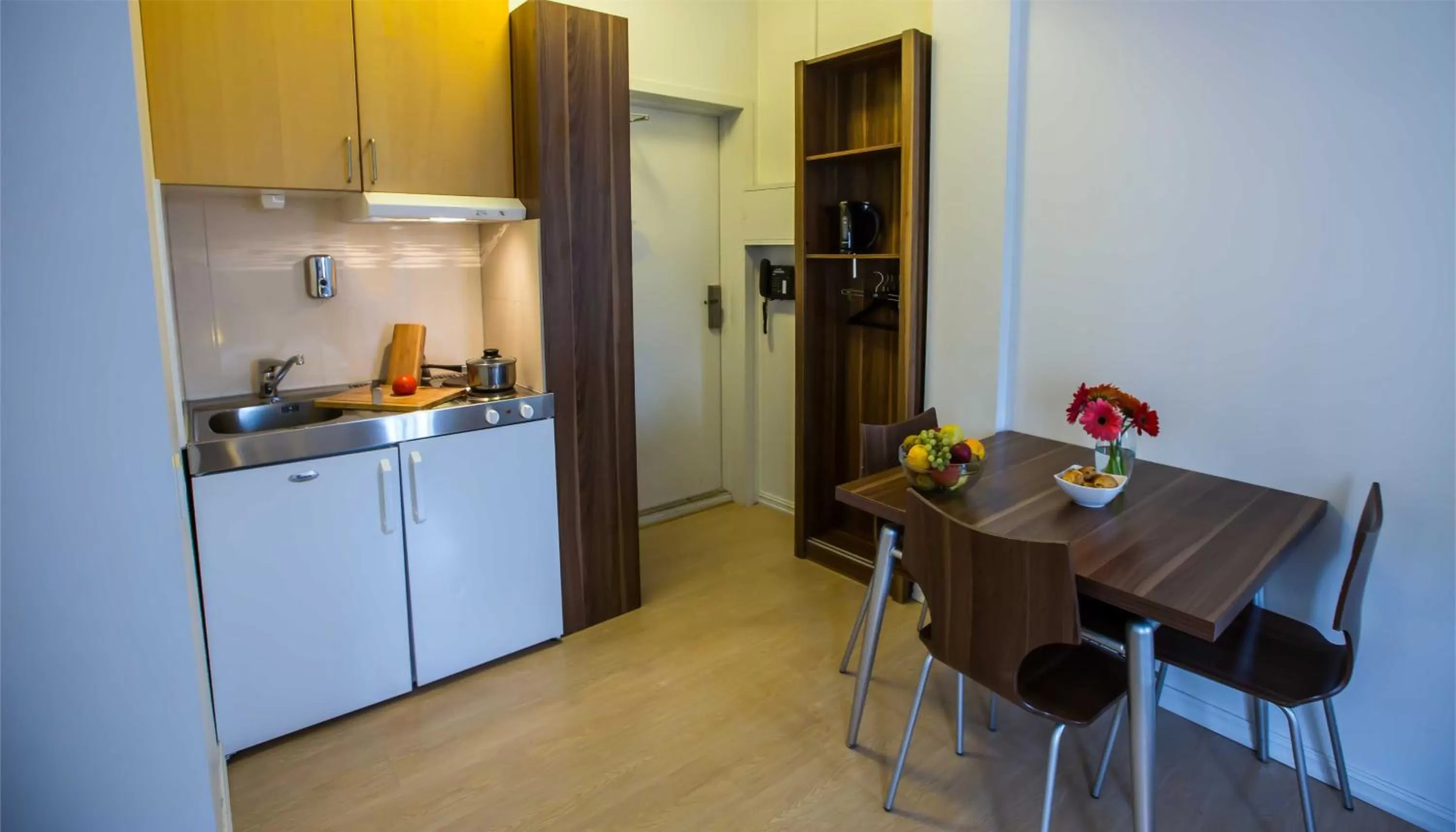 Kitchen or kitchenette in Central City Apartments