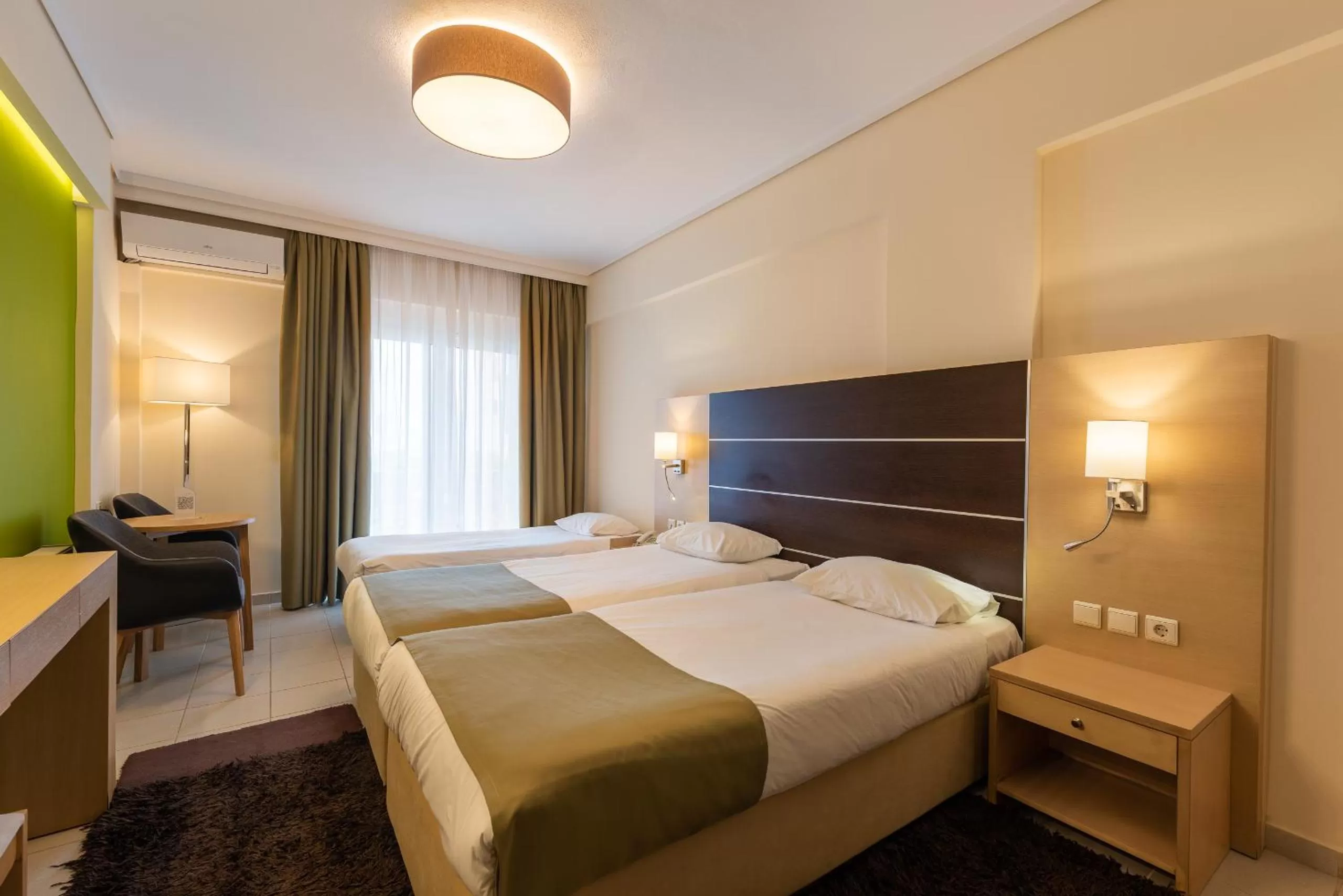 Bedroom, Bed in Heliotrope Hotels