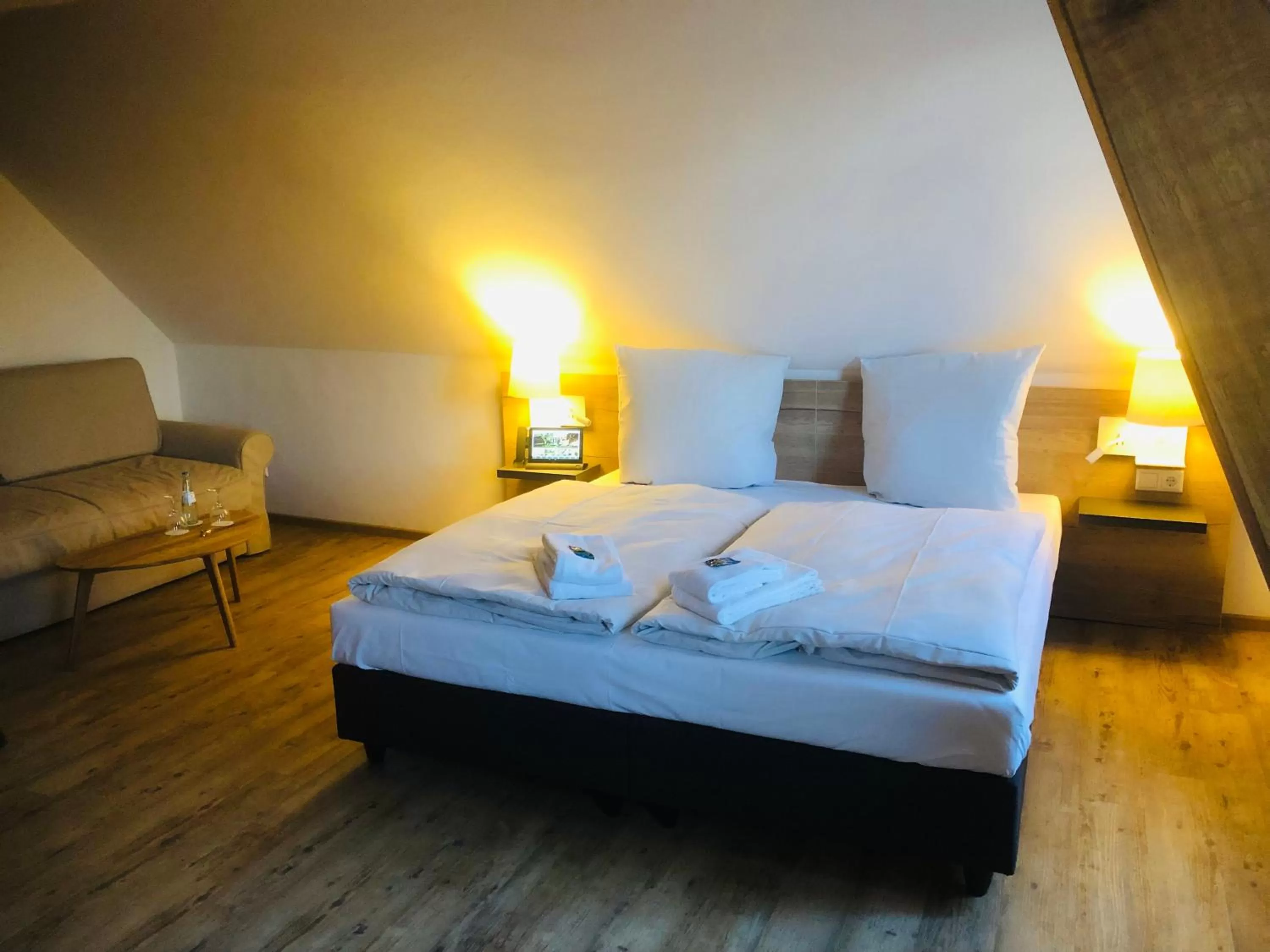 Photo of the whole room, Bed in Landhotel Gutshof im Oertzetal in Oldendorf, Südheide