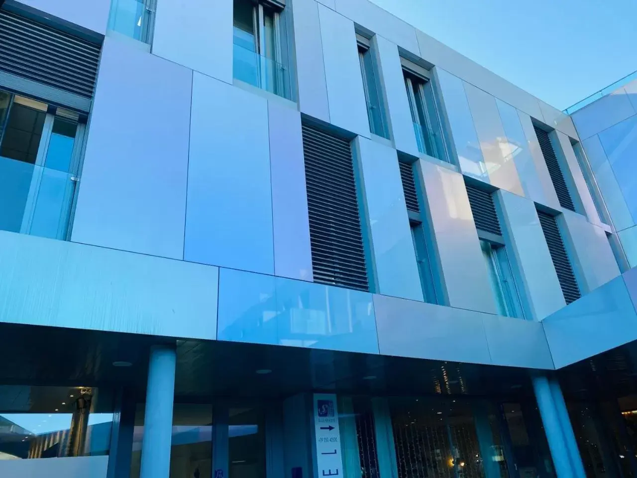 Property building in Blue Shades Hotel Property building in Blue Shades Hotel