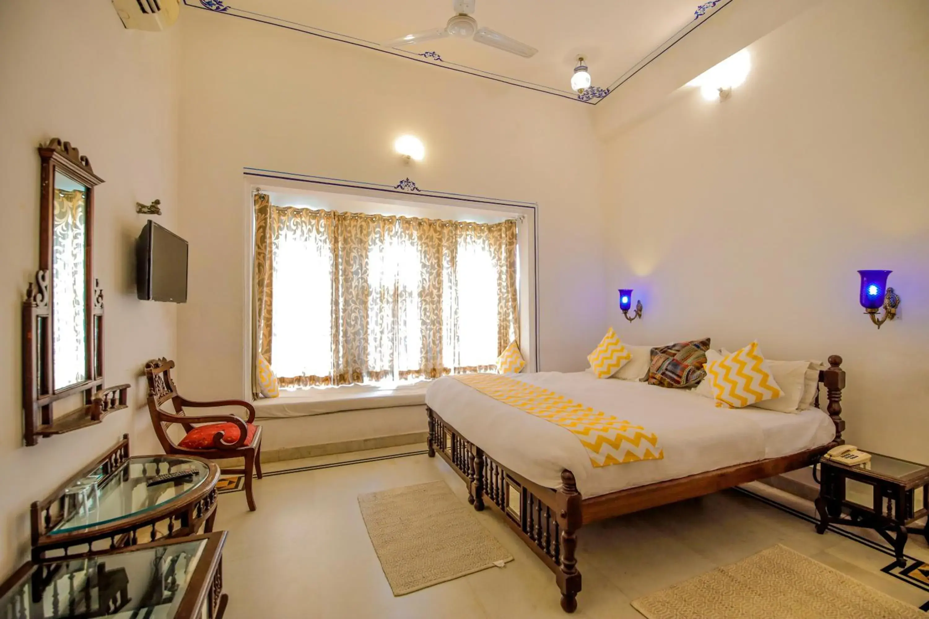 Photo of the whole room, Bed in Hotel Devraj Niwas on Lake Pichola Udaipur