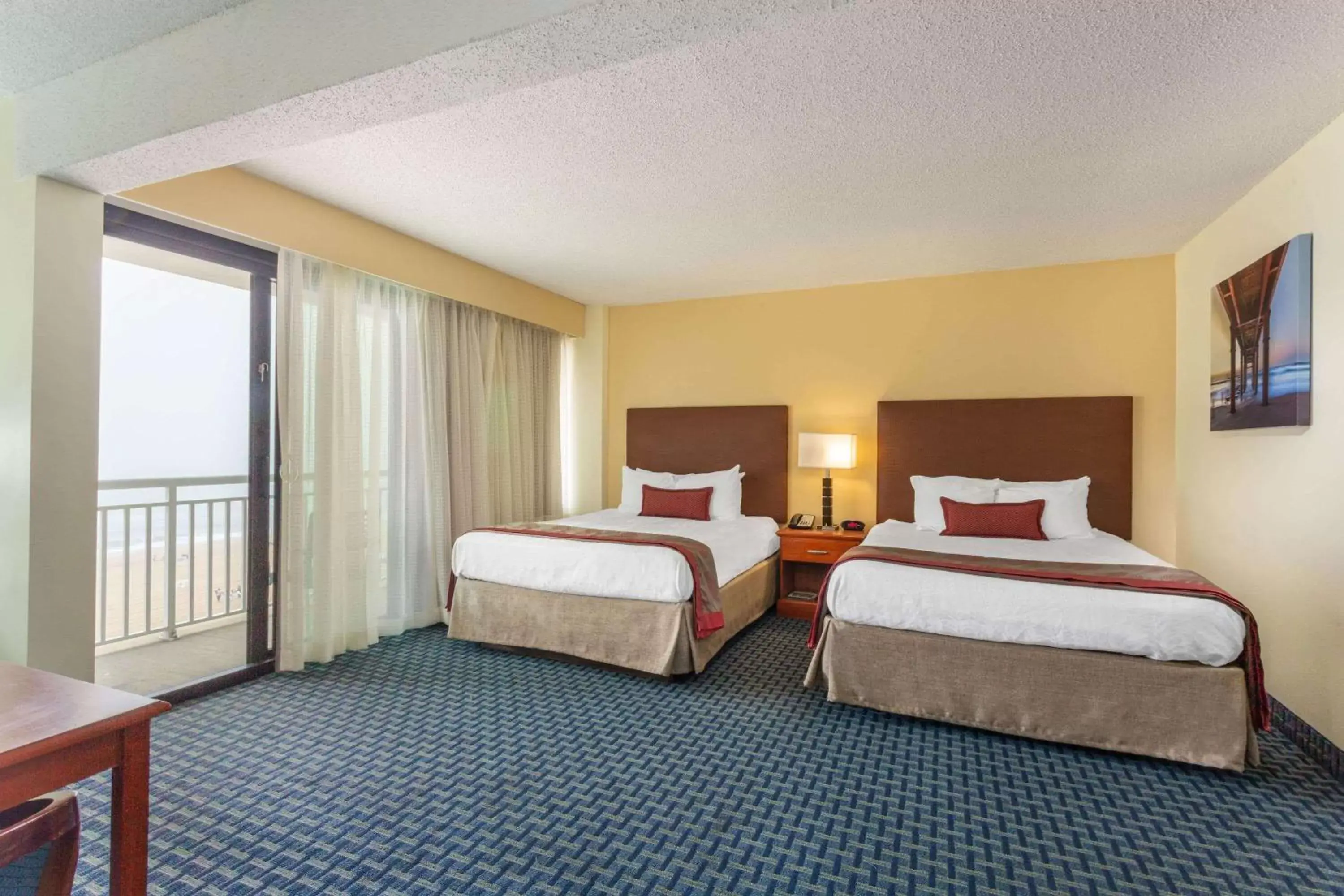 Photo of the whole room, Bed in Ramada Plaza by Wyndham Virginia Beach