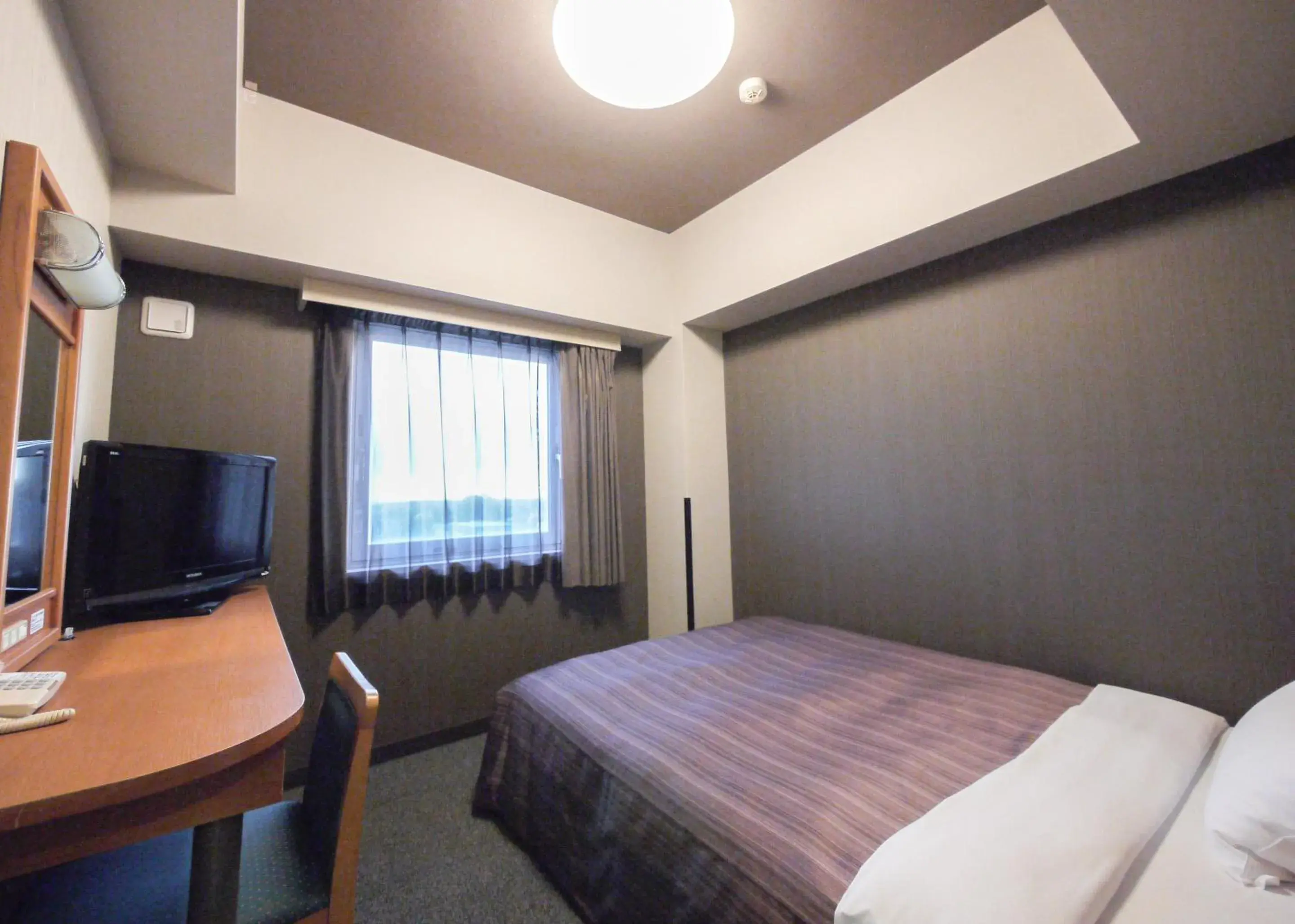 Bed in Hotel Route-Inn Omaezaki