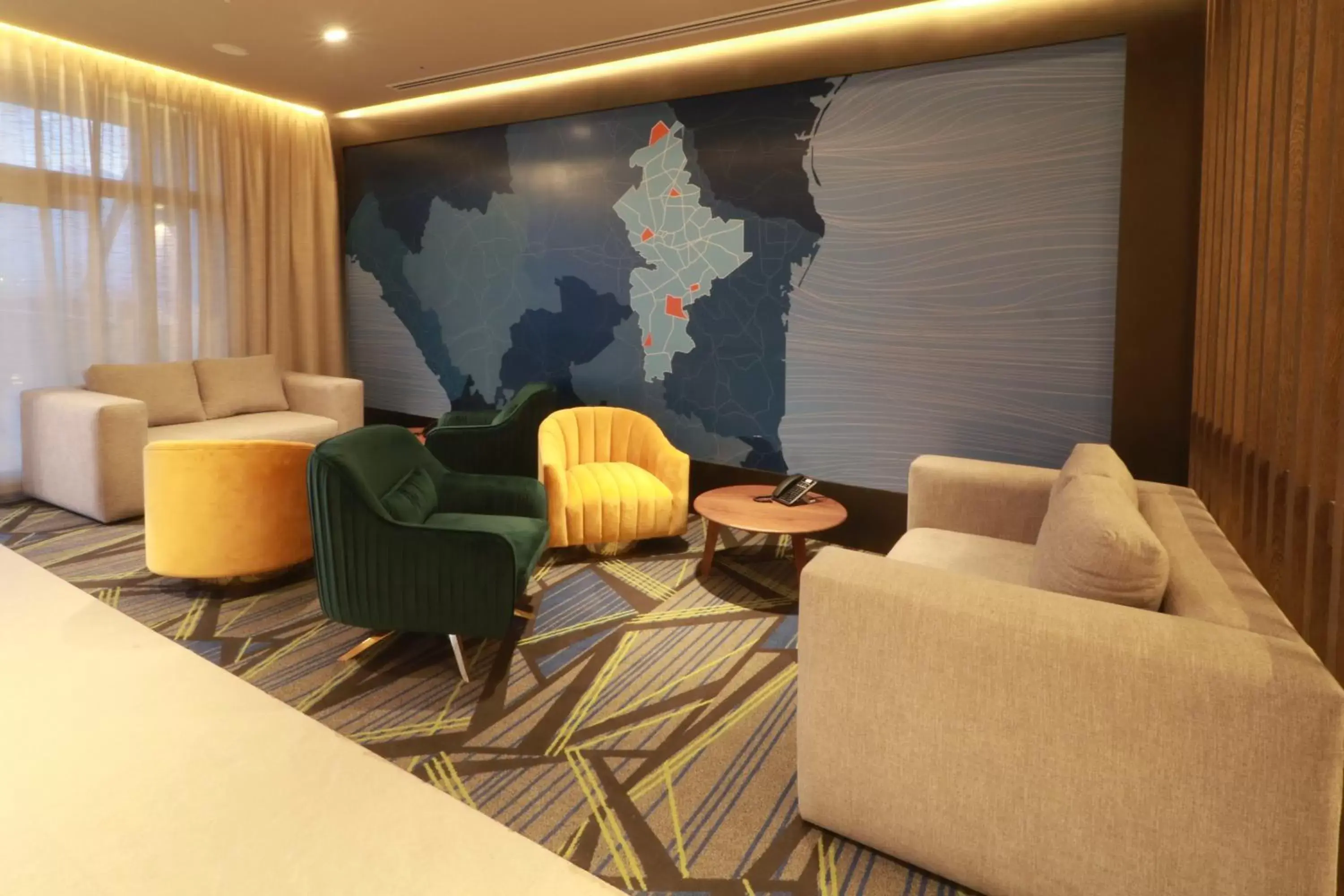 Living room in Holiday Inn Express - Monterrey - Fundidora by IHG Living room in Holiday Inn Express - Monterrey - Fundidora by IHG