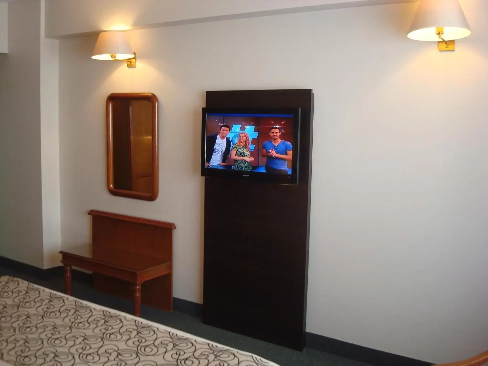 TV and multimedia, TV/Entertainment Center in Centuria Hotel Buenos Aires