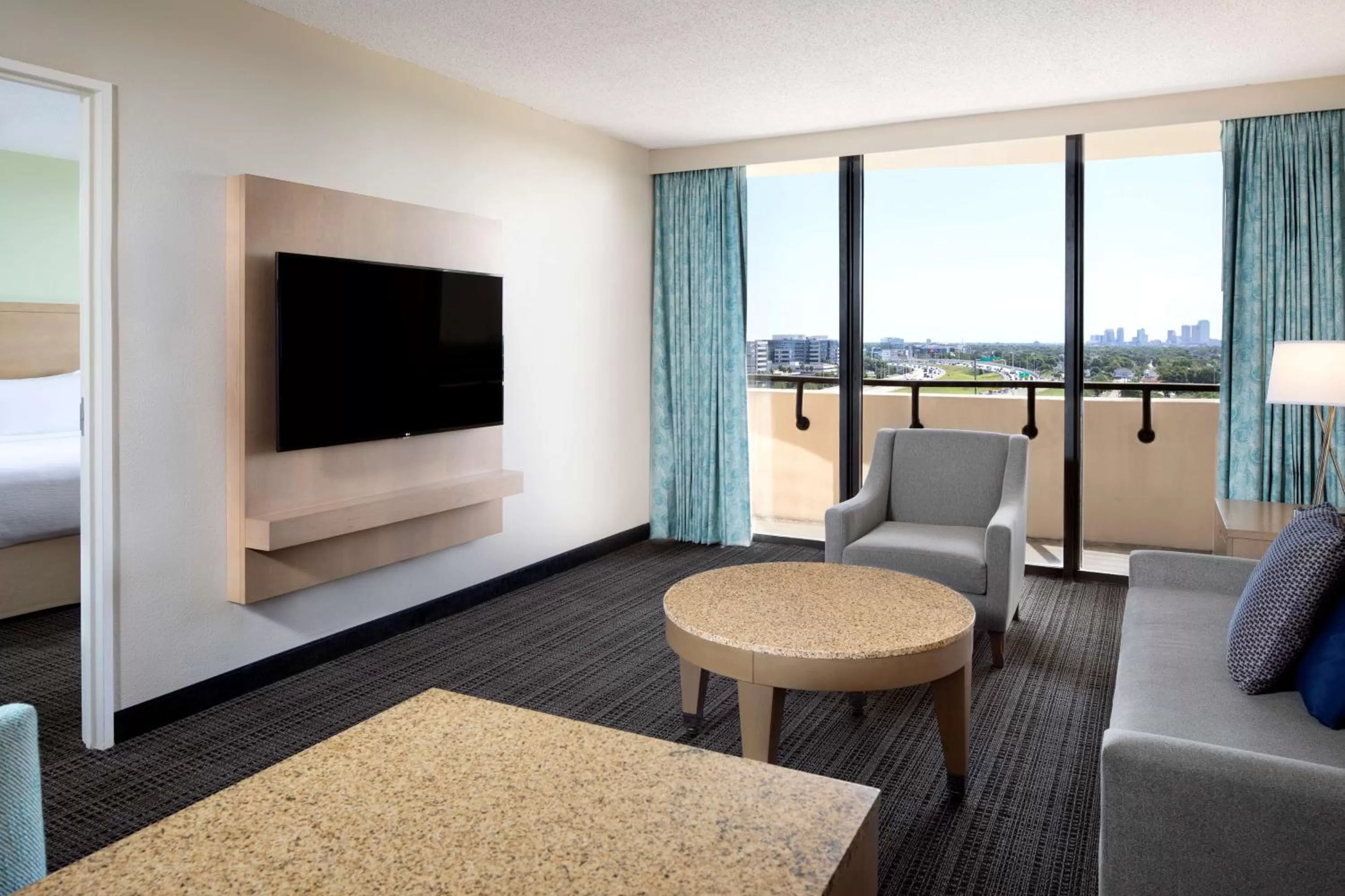Living room, Bed in Embassy Suites by Hilton Tampa Airport Westshore