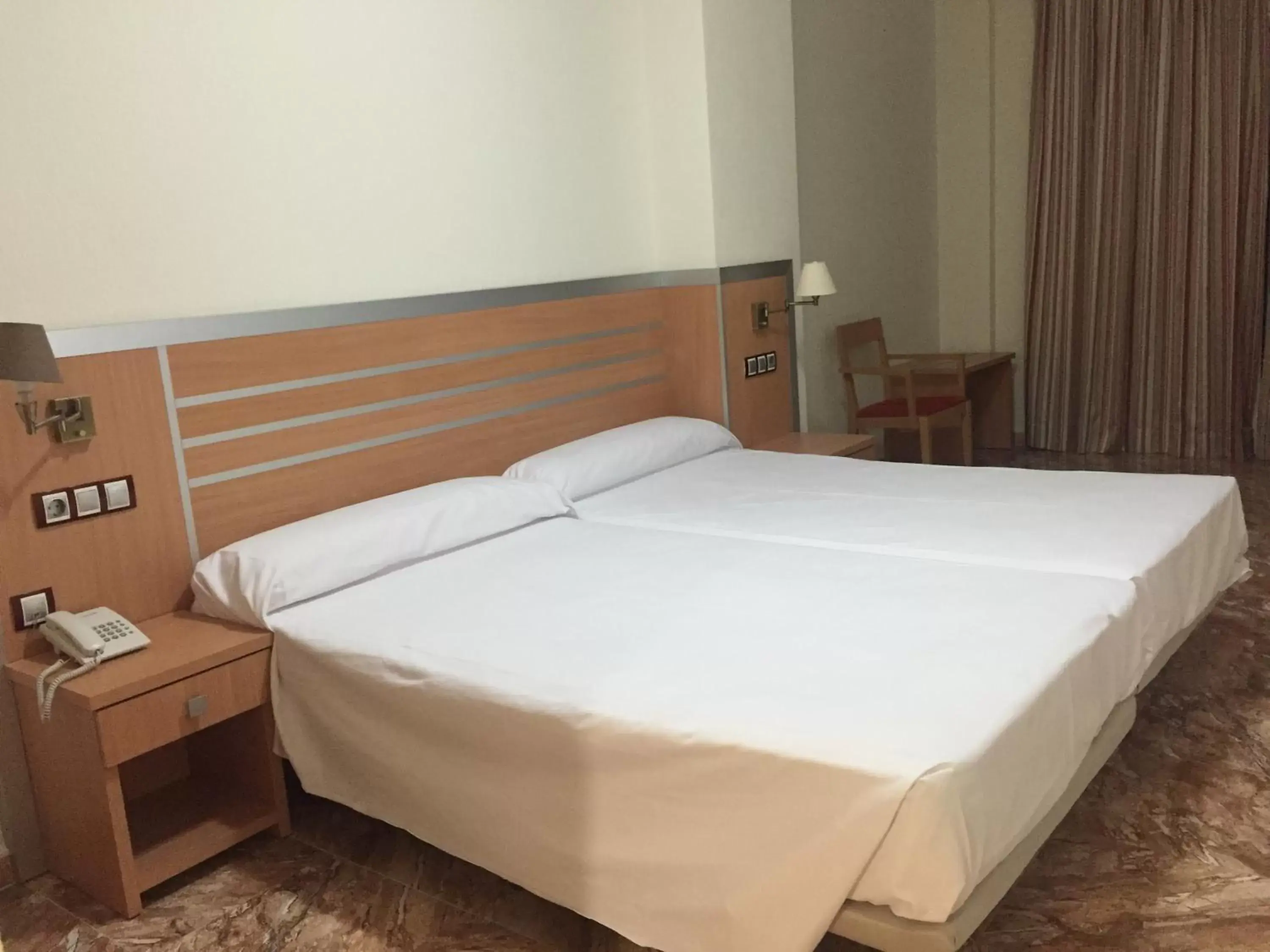 Bed in Hotel La Familia