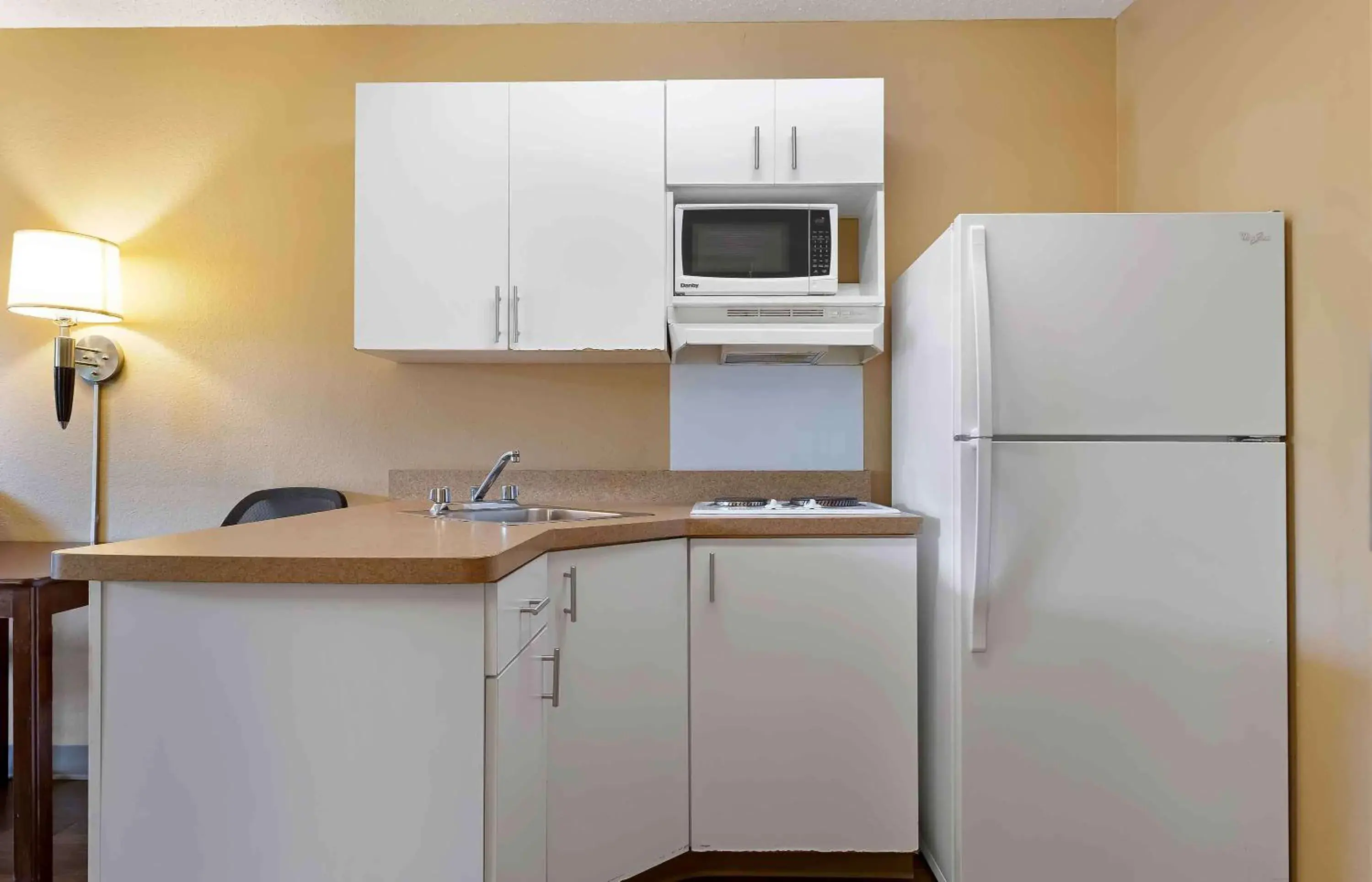 Bedroom, Kitchen/Kitchenette in Sonesta Simply Suites Lansing