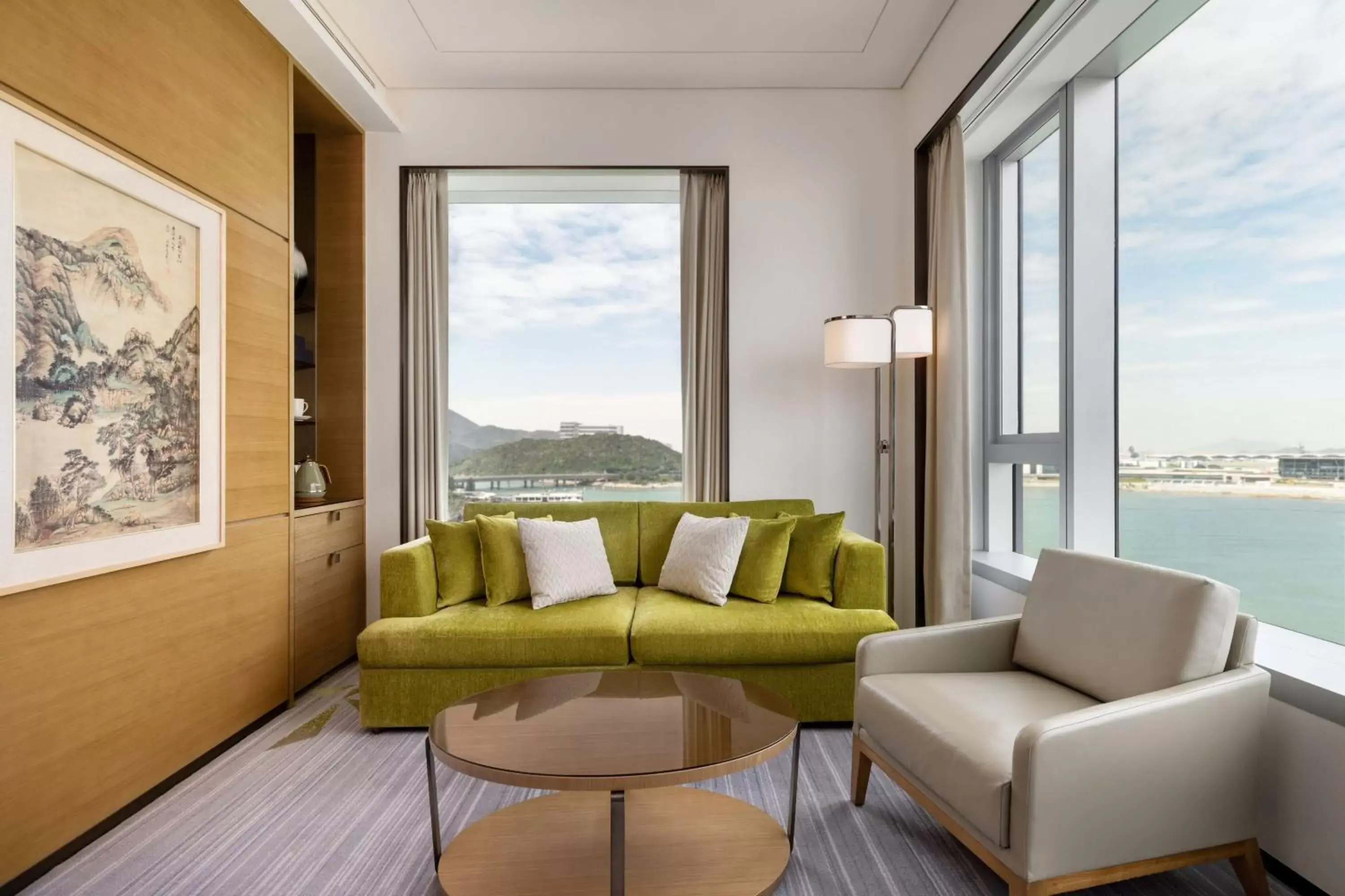 Photo of the whole room, Seating Area in Sheraton Hong Kong Tung Chung Hotel