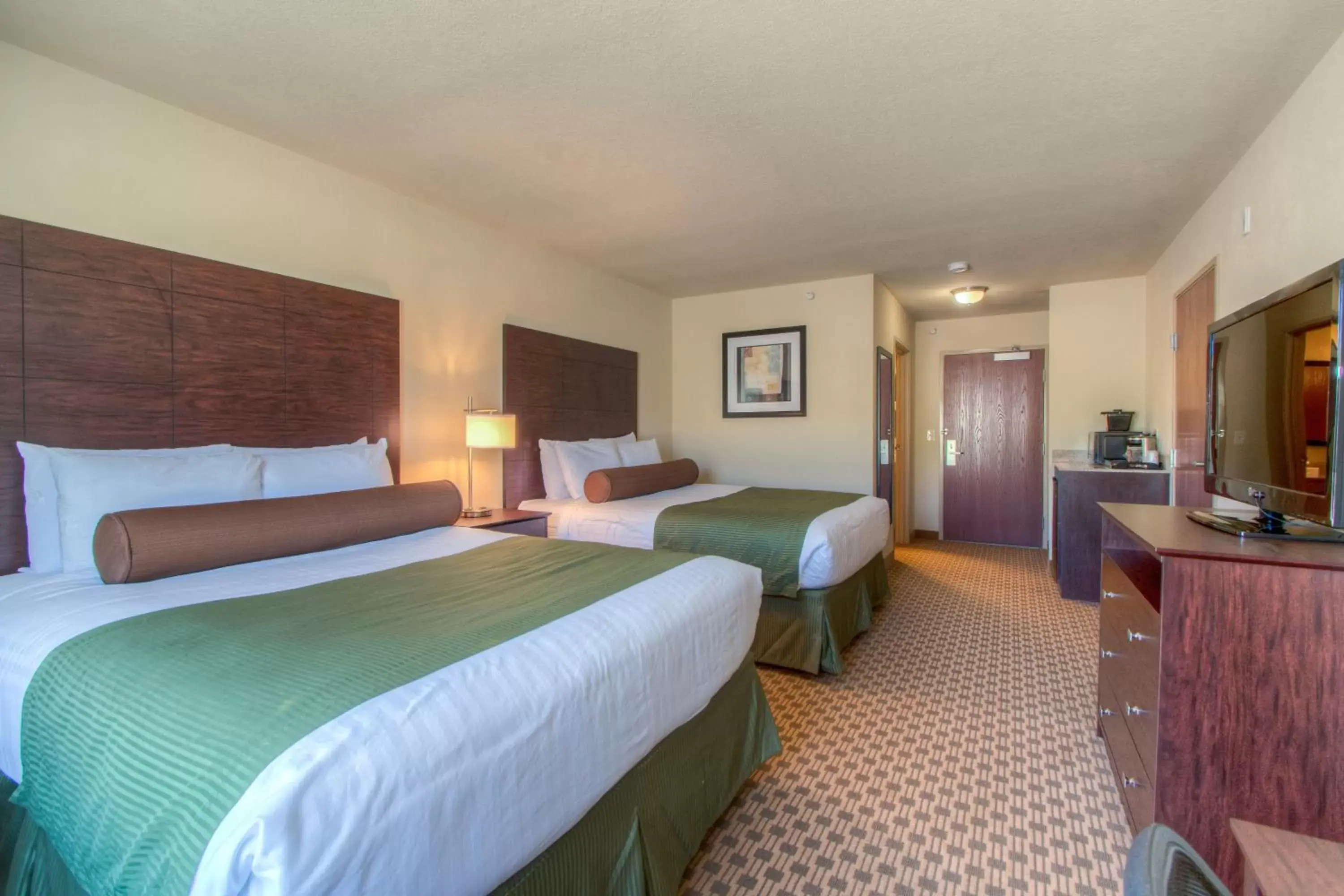 Bed in Cobblestone Inn & Suites - Wray