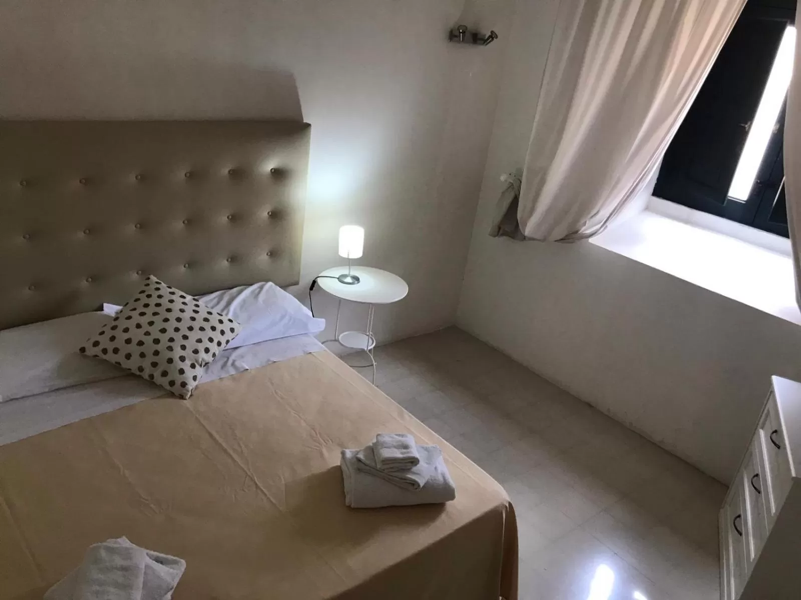 Bed in Landolina Palace Hotel