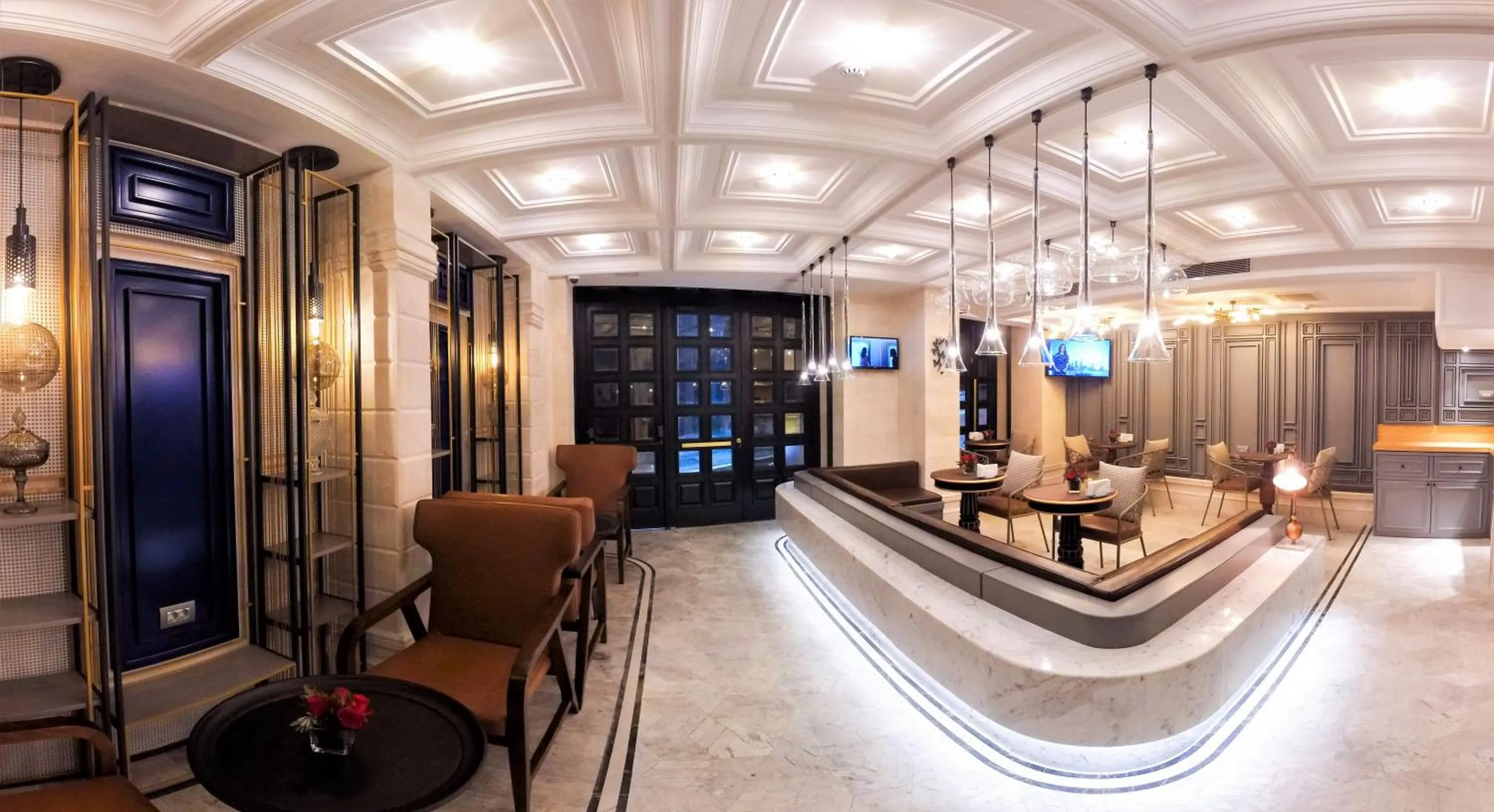 Seating area in Maroon Tomtom