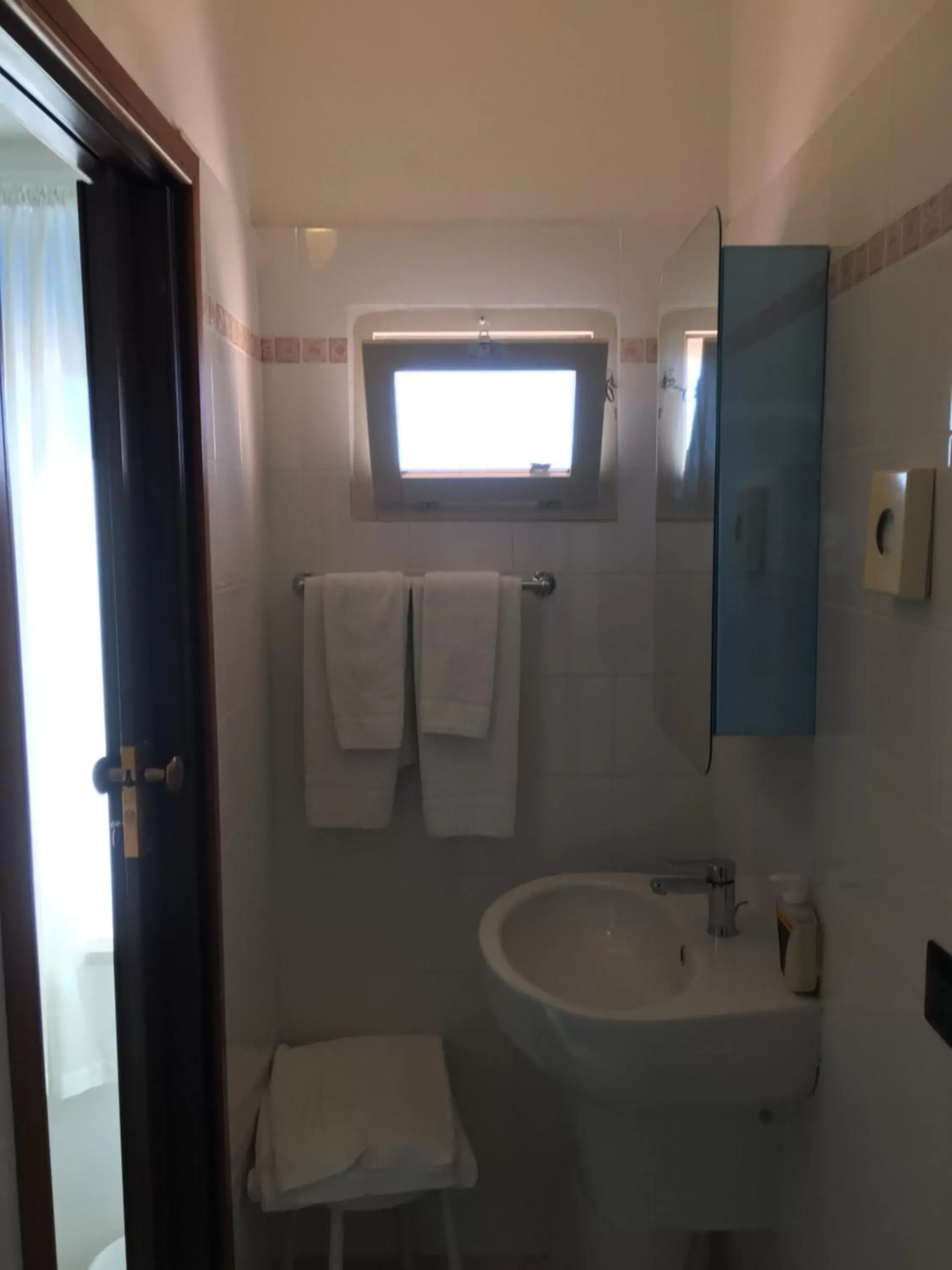 Bathroom in Dea Della Salute Hotel