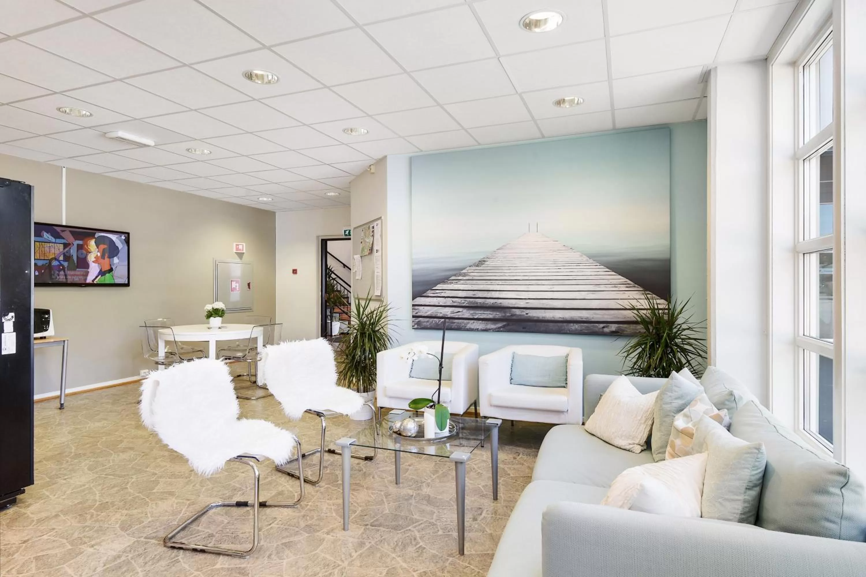 Communal lounge/ TV room in Kongsvinger Budget Hotel