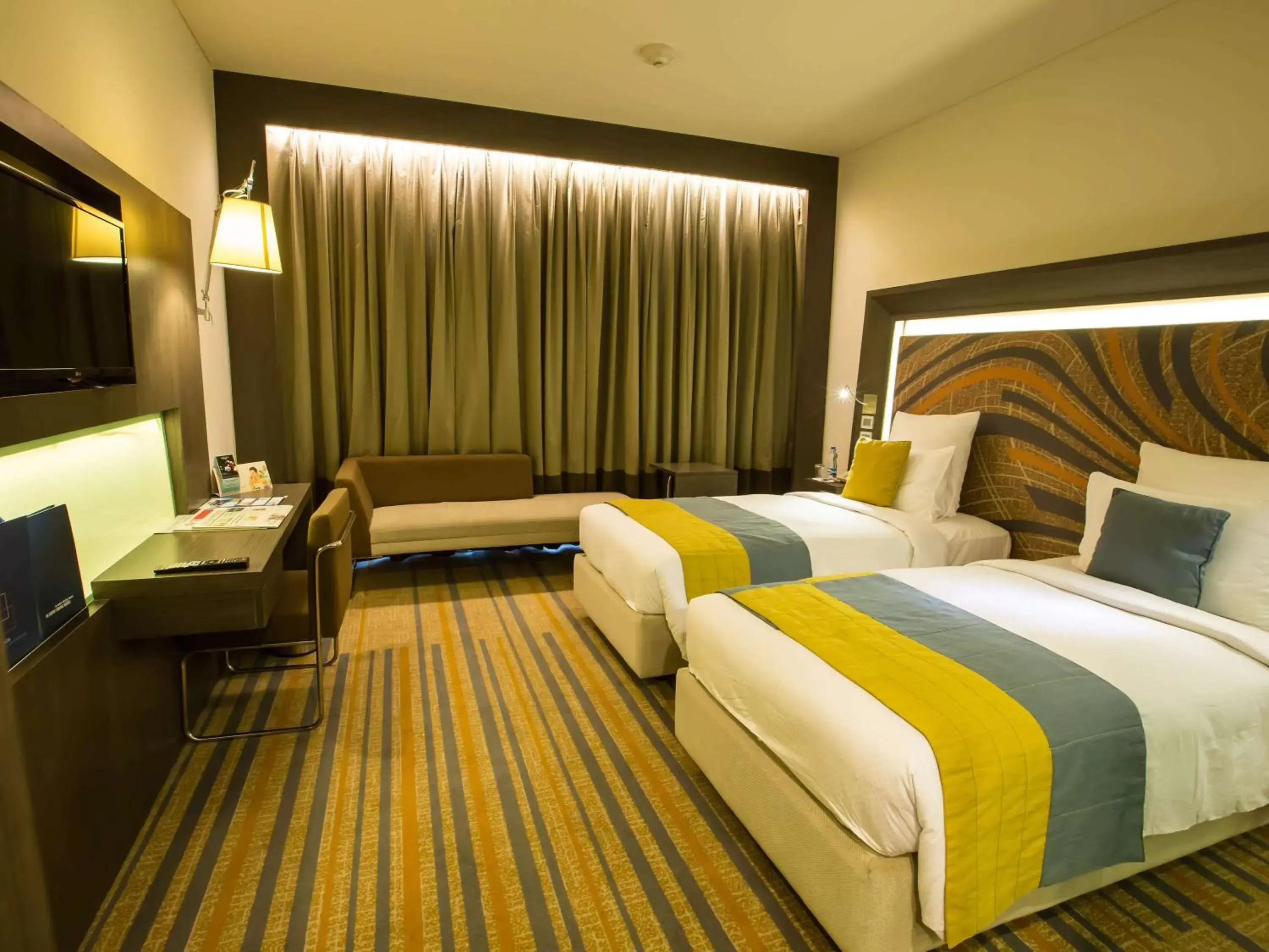 Photo of the whole room, Bed in Novotel Kolkata Hotel and Residences