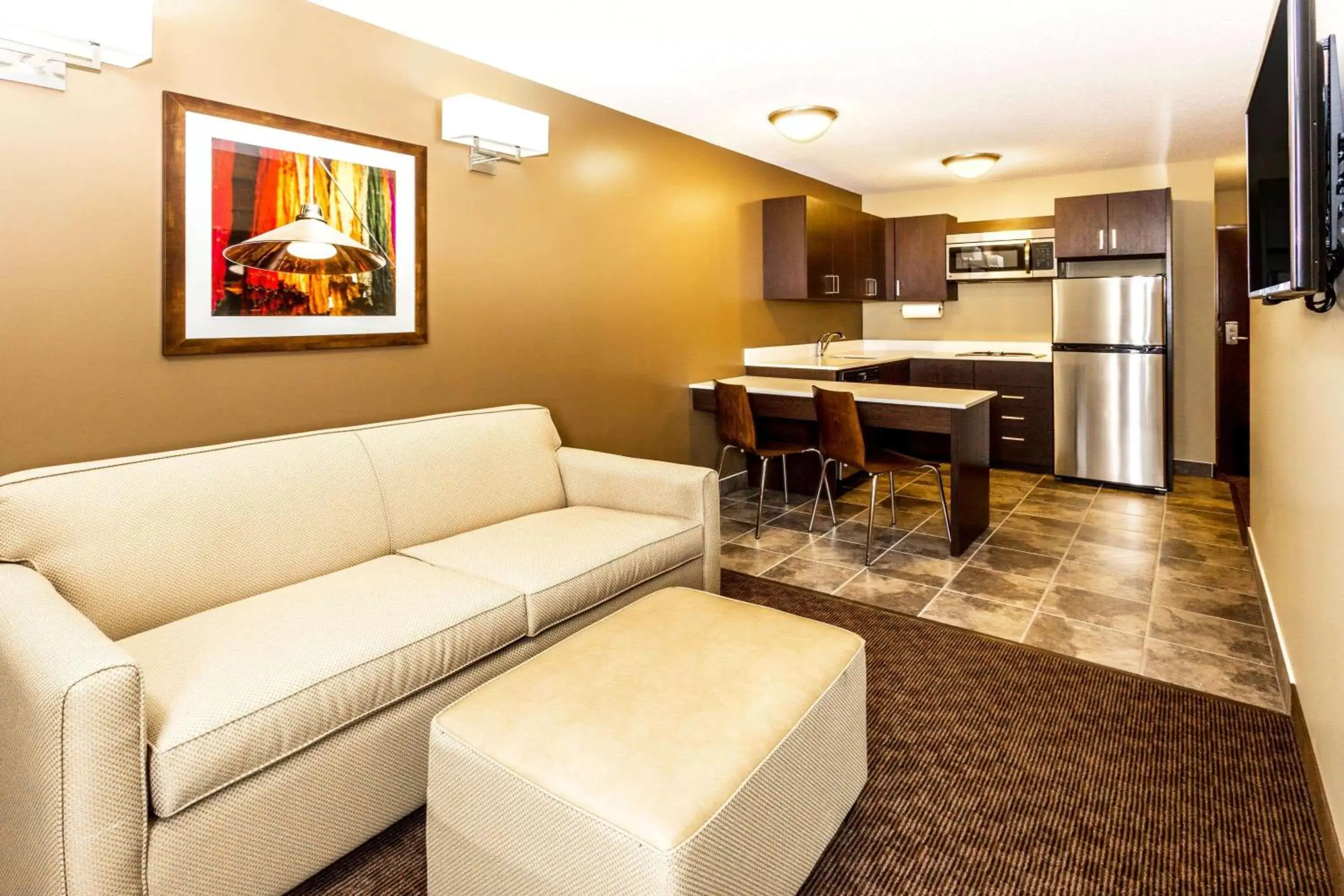 Photo of the whole room, Seating Area in Microtel Inn & Suites by Wyndham Whitecourt