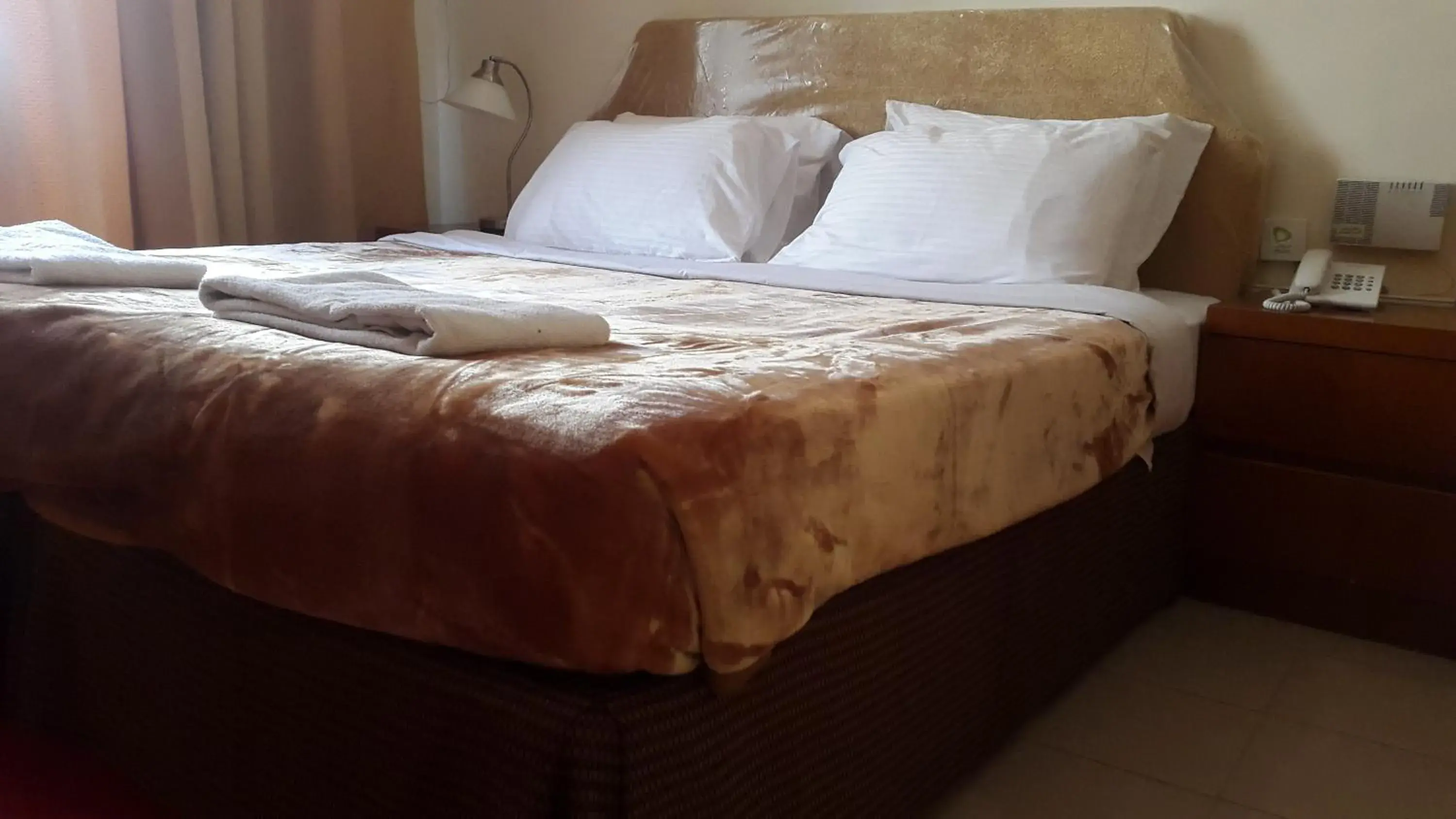 Bed in AL Raien Hotel Apartment