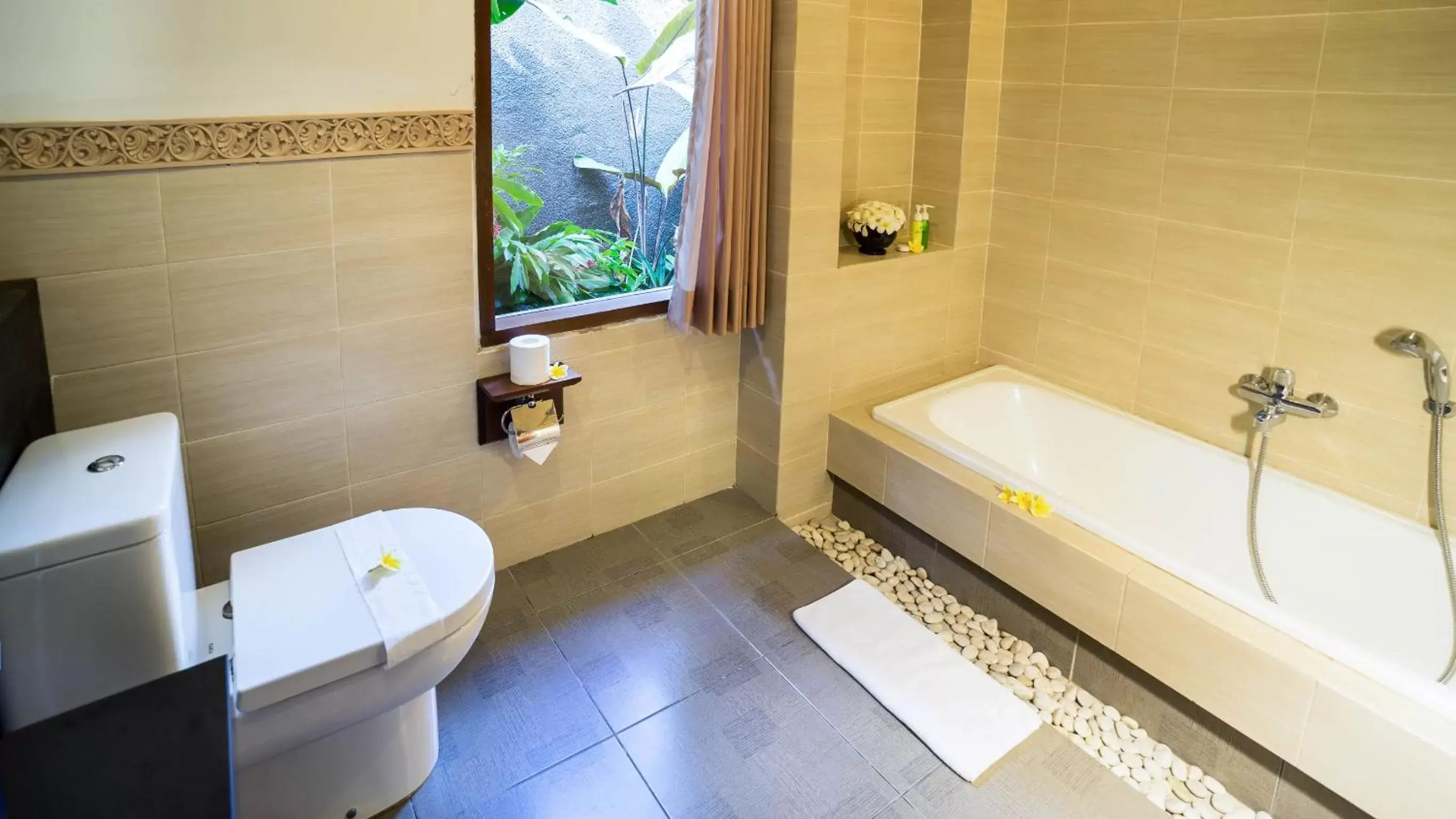 Photo of the whole room, Bathroom in Kori Ubud Resort, Restaurant & Spa