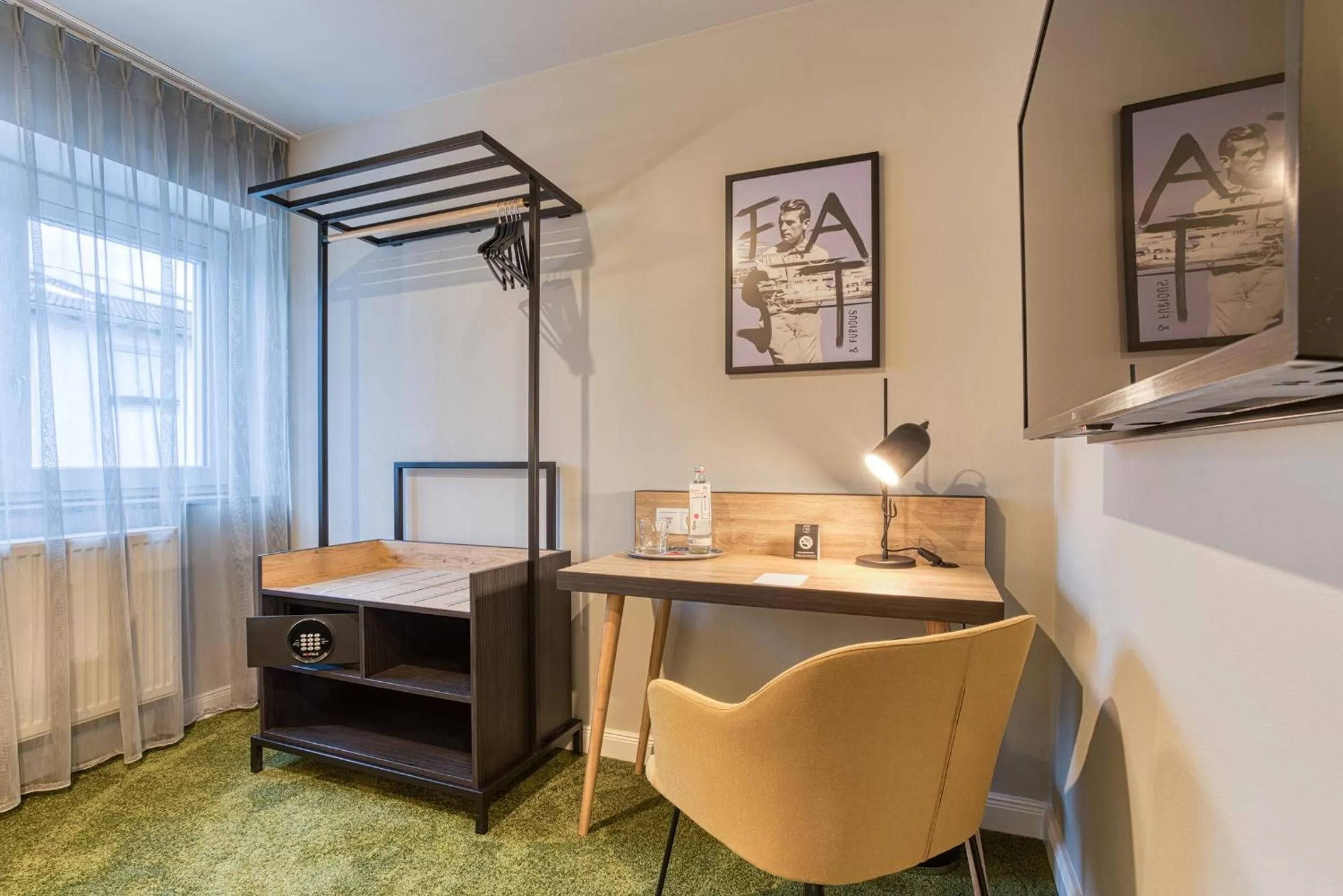 Photo of the whole room, TV/Entertainment Center in NYCE Hotel Ingolstadt