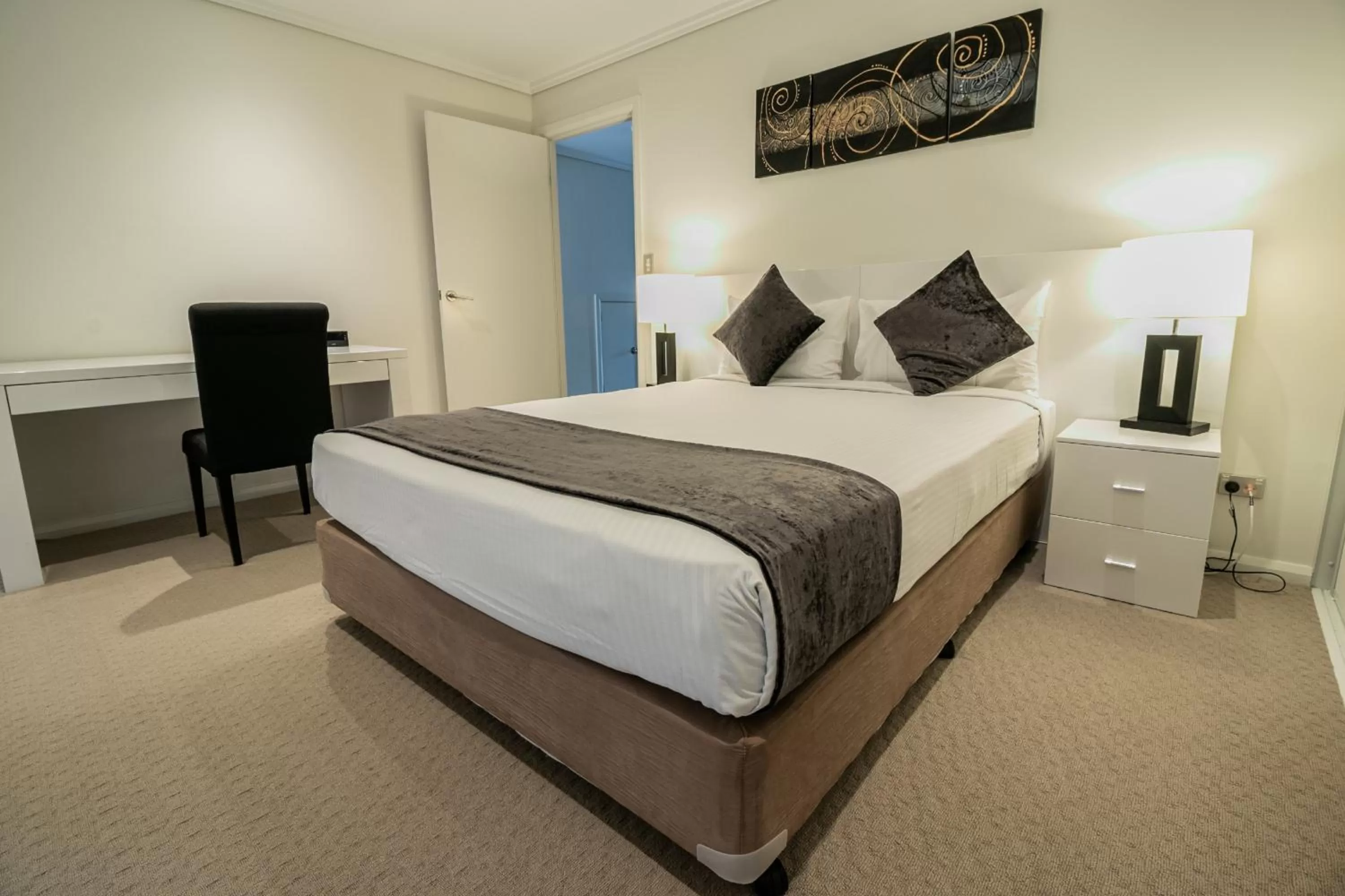 Bed in Absolute Beachfront Opal Cove Resort