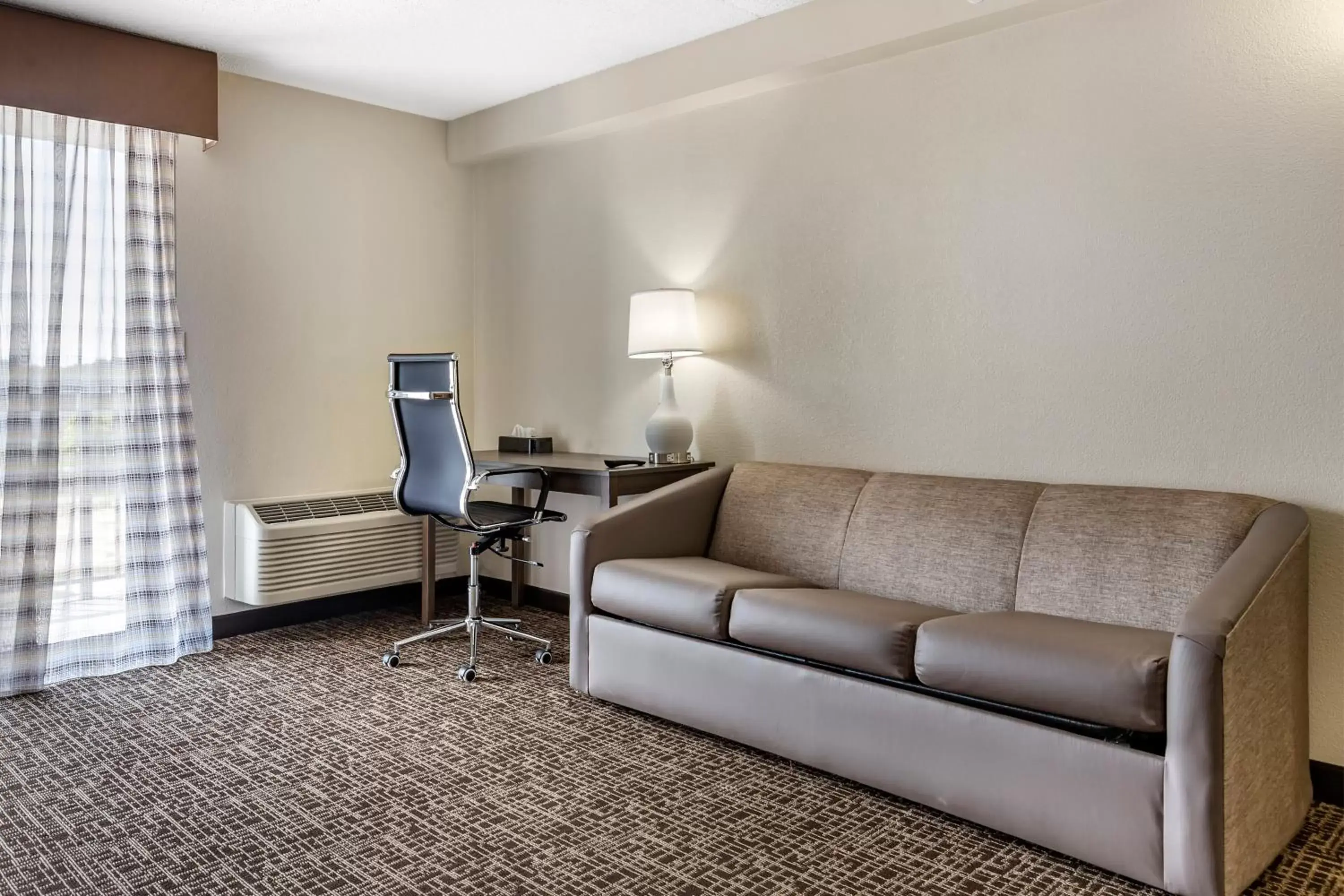Seating Area in Quality Inn & Suites Spring Lake - Fayetteville Near Fort Liberty