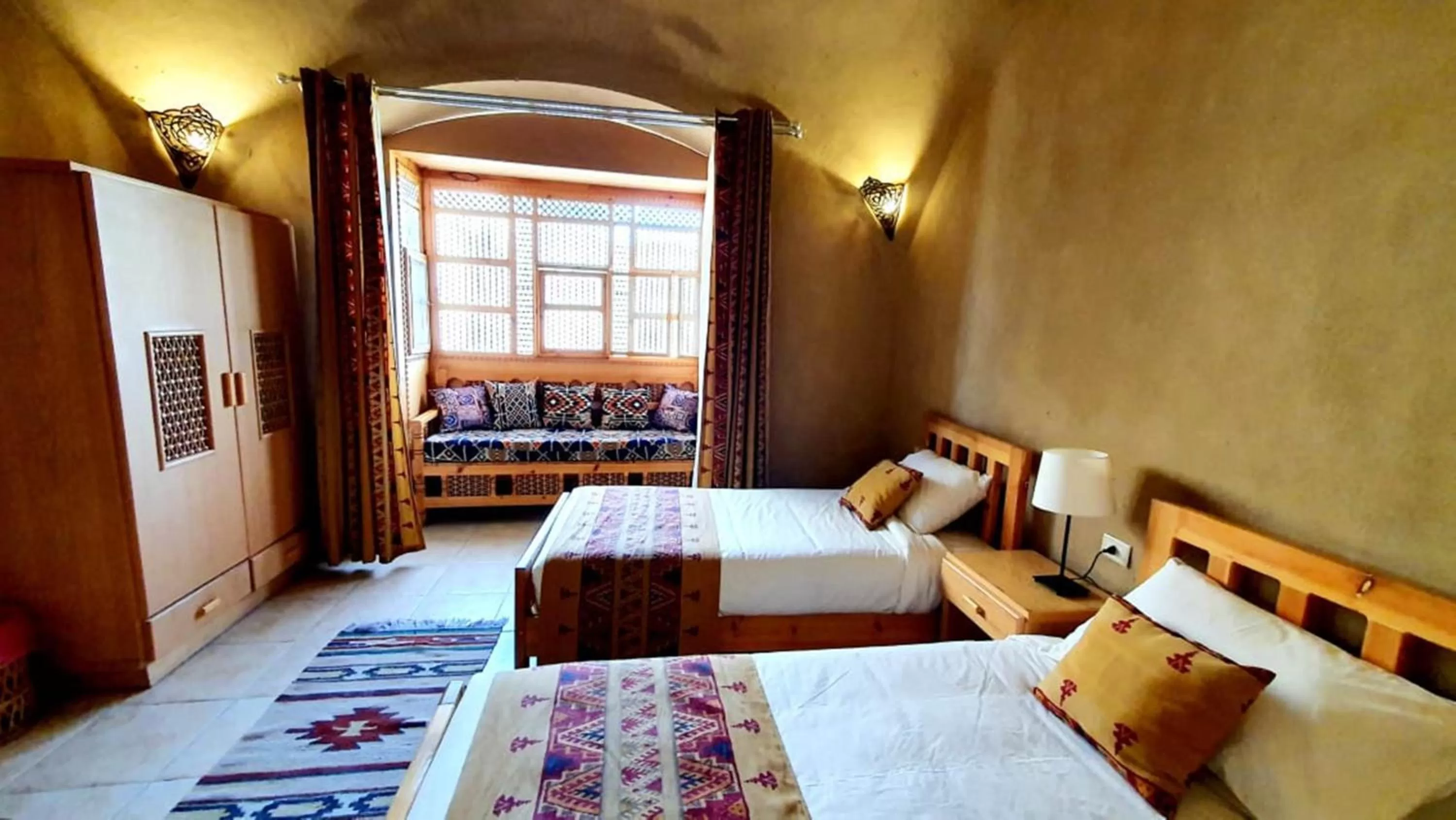 Bed in Embrace Hotel