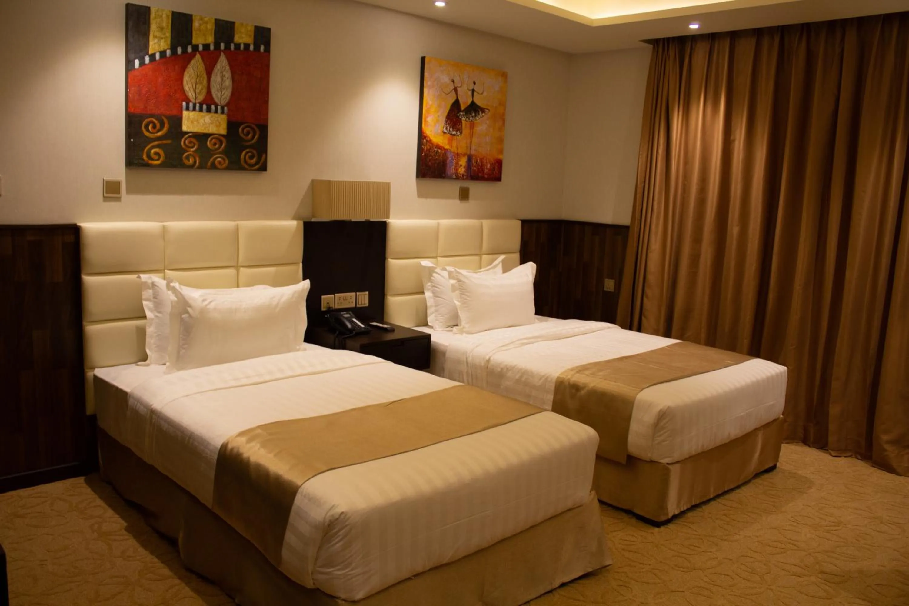 Bed in The Secure Inn Hotel Muscat