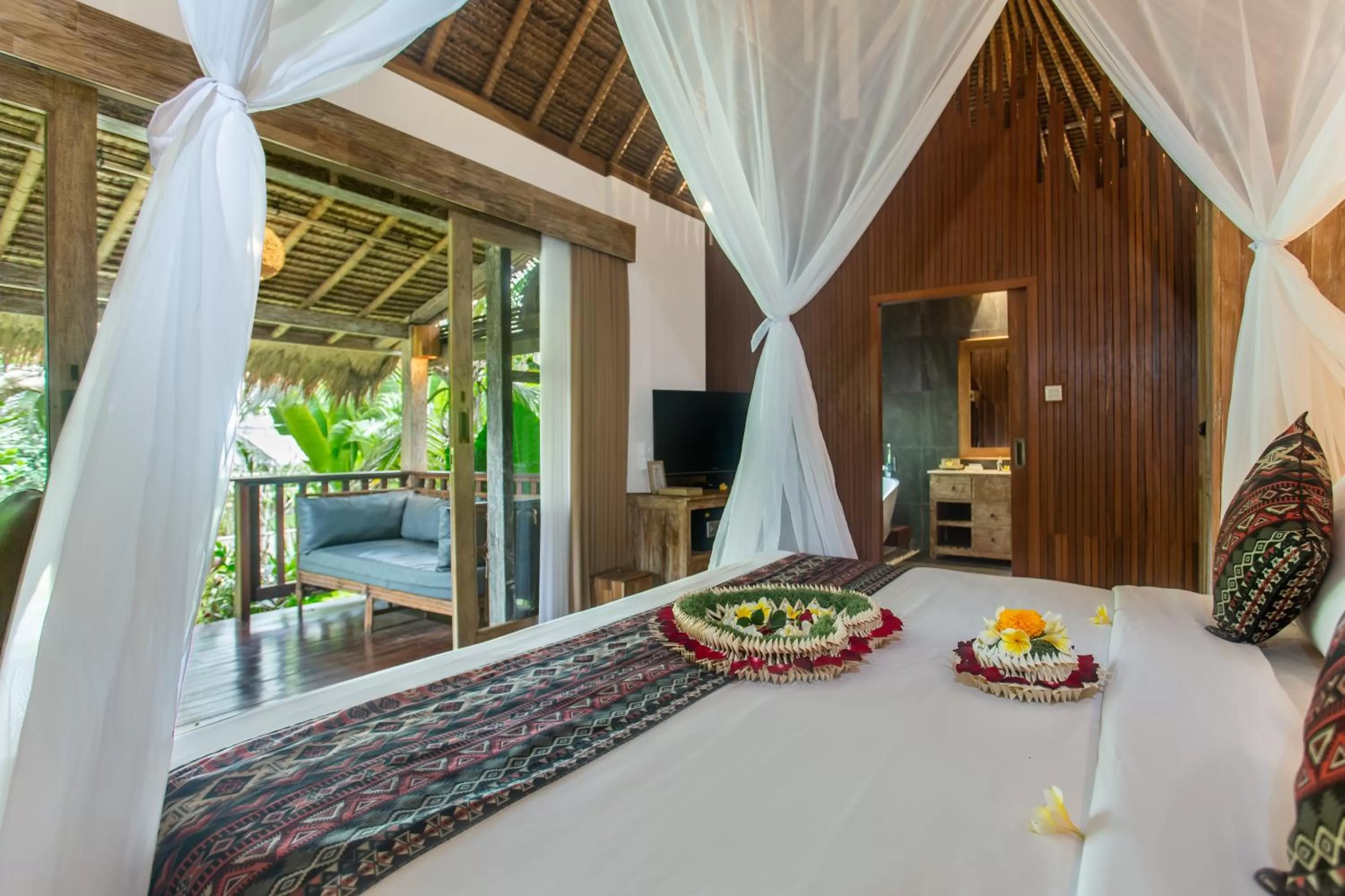 Balcony/Terrace, Bed in Manah Shanti Suites by GenuineHost