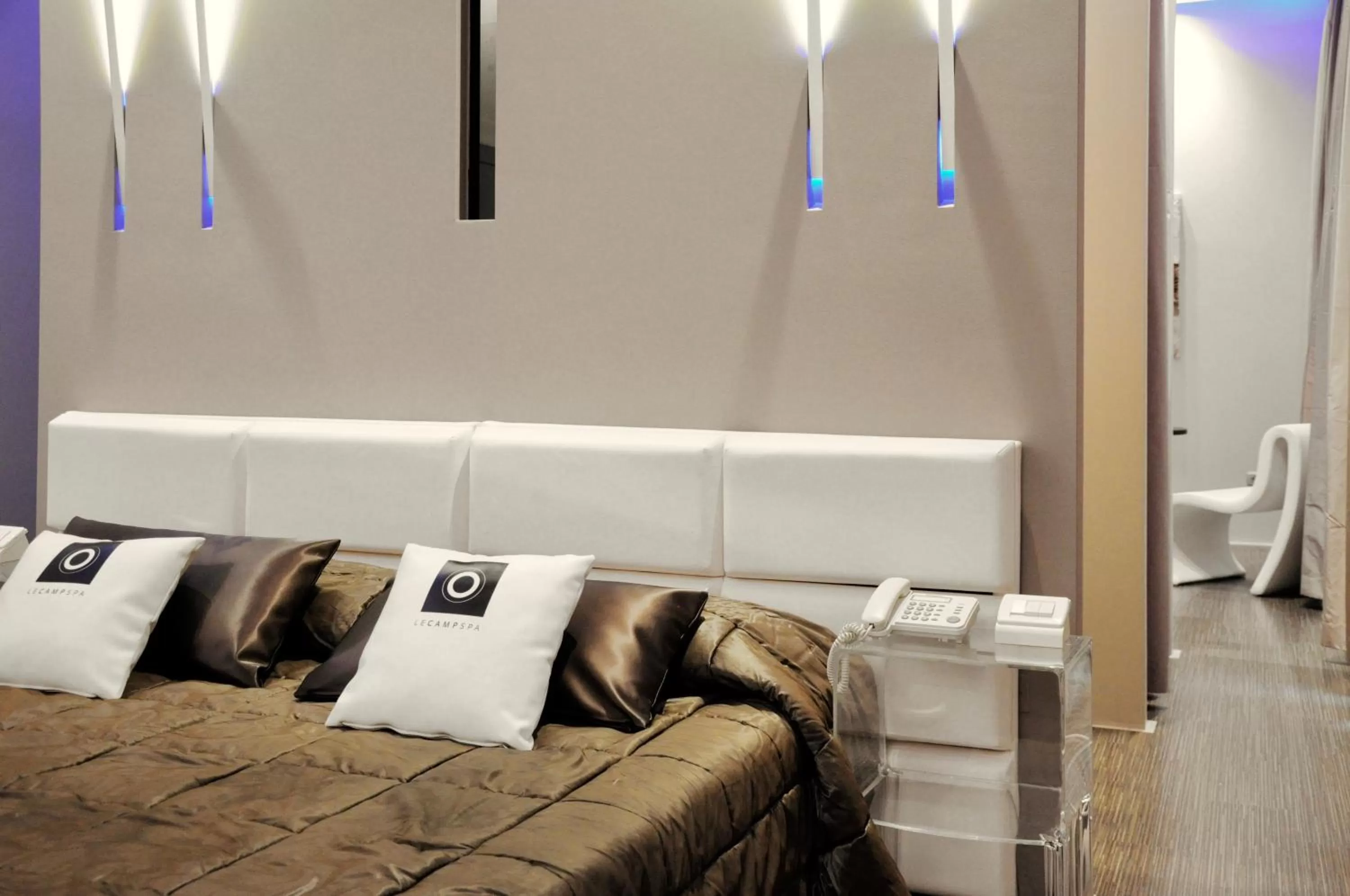 Bed in Le Camp Suite & Spa