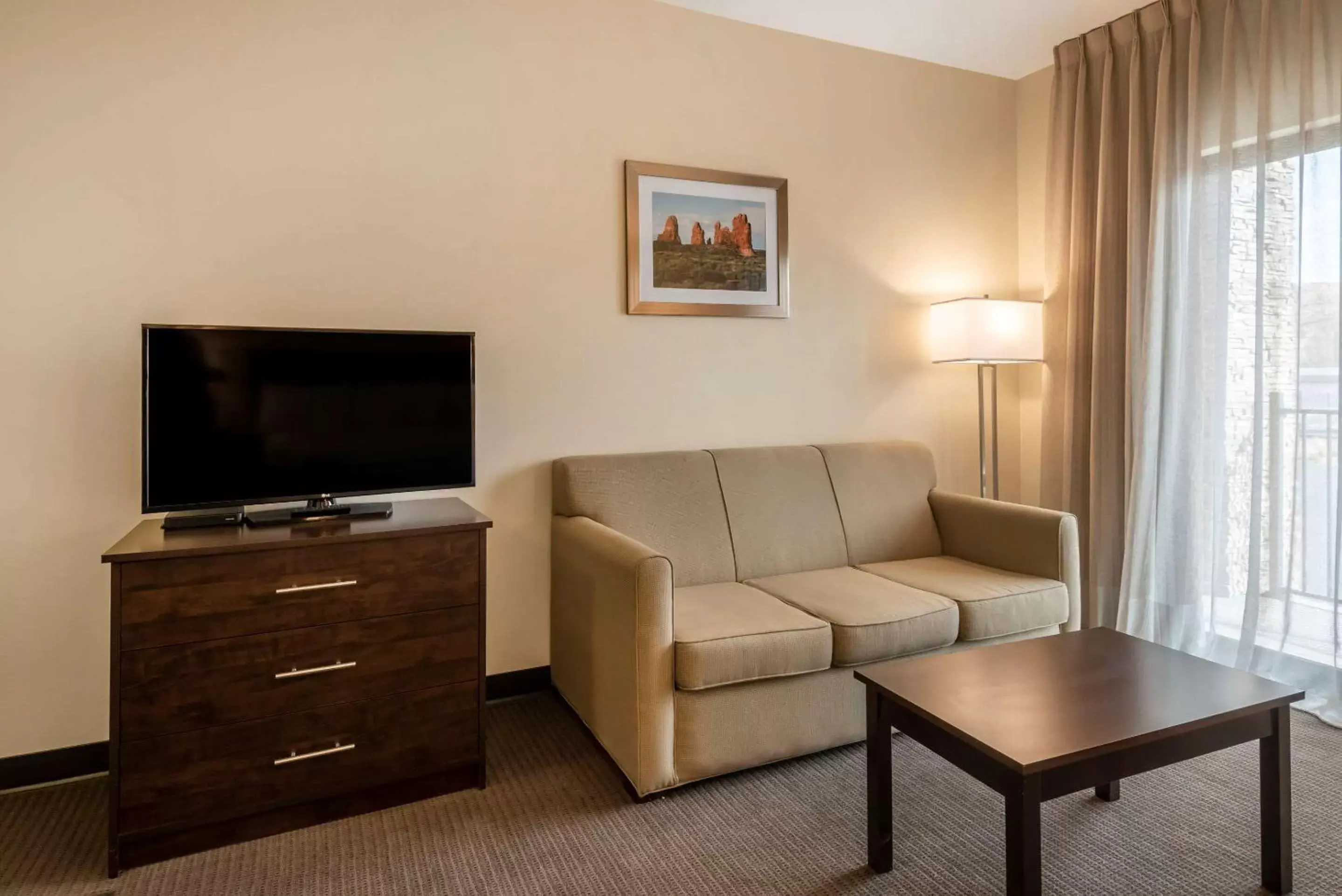 Photo of the whole room, Seating Area in MainStay Suites Moab near Arches National Park