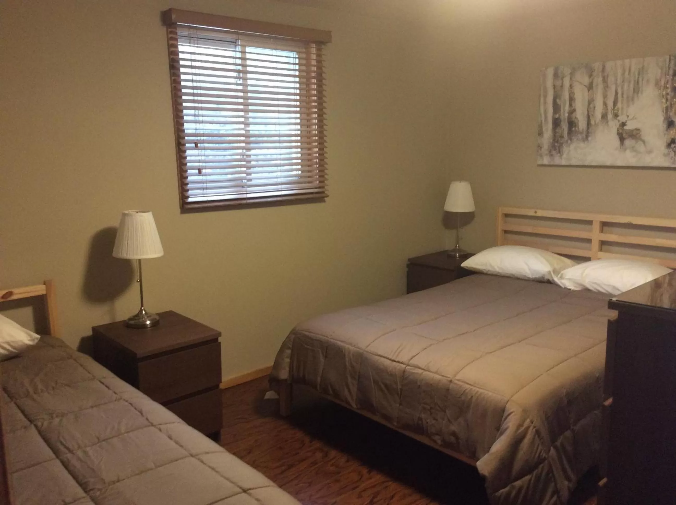 Bed in Madawaska Lodge