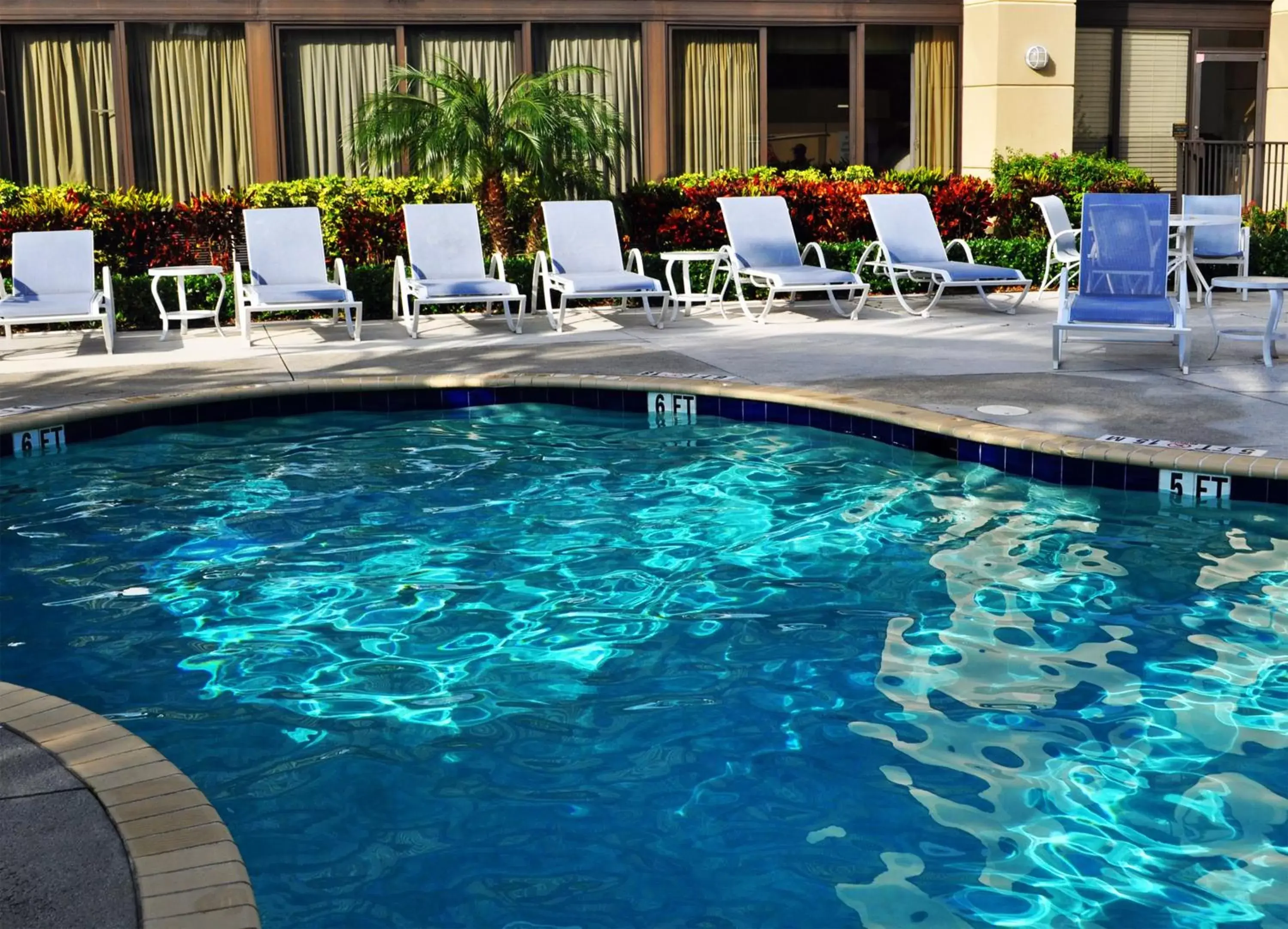 Property building, Swimming Pool in Holiday Inn Express Boca Raton - West, an IHG Hotel