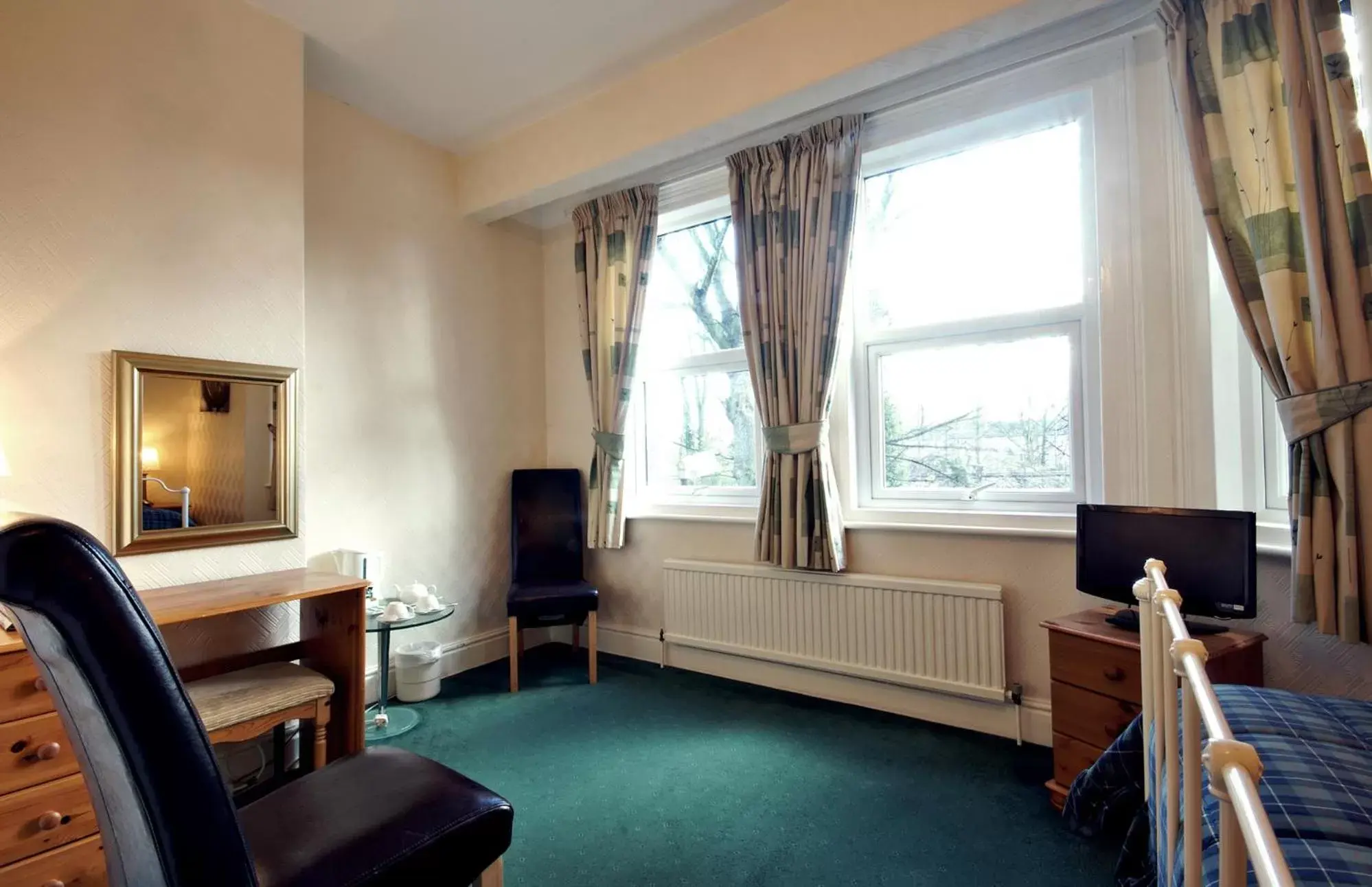 Bedroom, Seating Area in St Marys Guest House