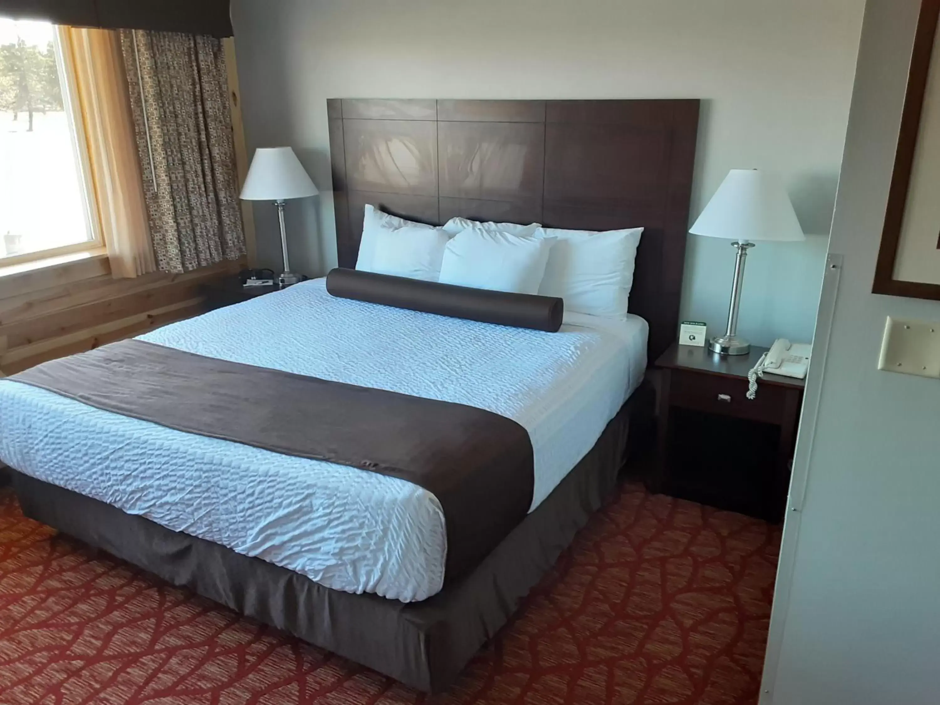 Bed in Boarders Inn & Suites by Cobblestone Hotels - Superior/Duluth