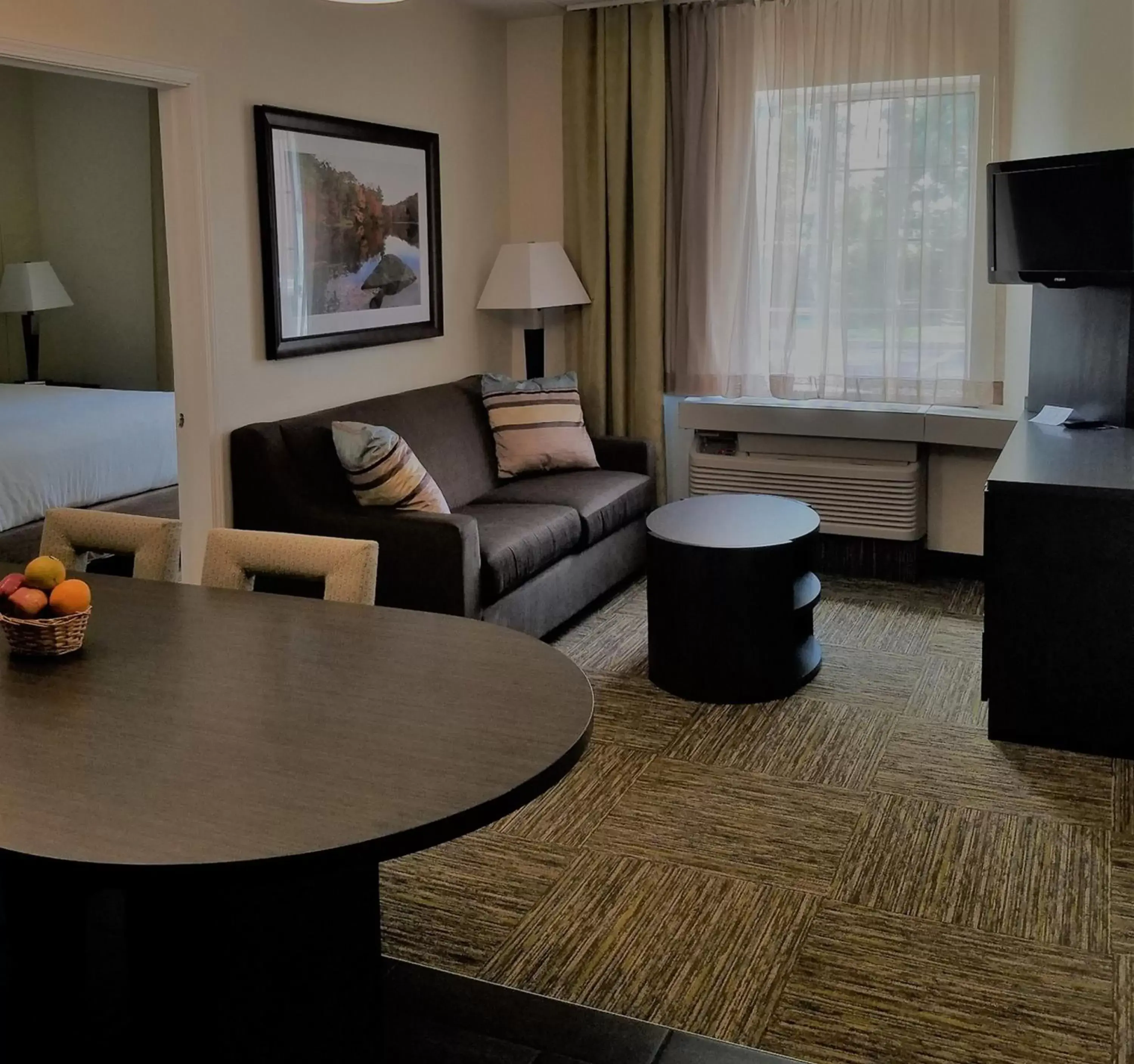 Photo of the whole room, Seating Area in Candlewood Suites - East Syracuse - Carrier Circle, an IHG Hotel