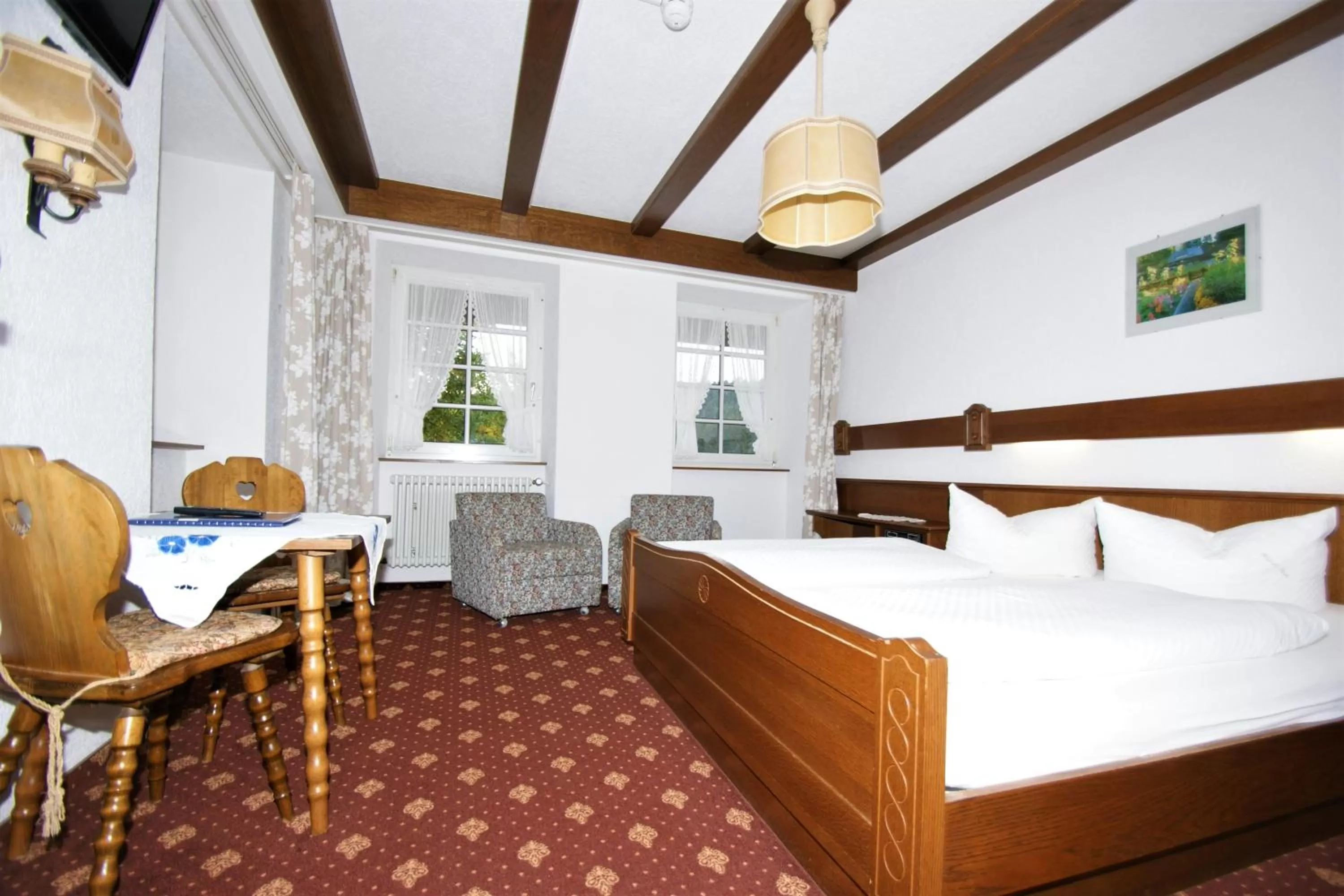Photo of the whole room, Bed in ZUR TRAUBE Schwarzwaldhotel & Restaurant am Titisee