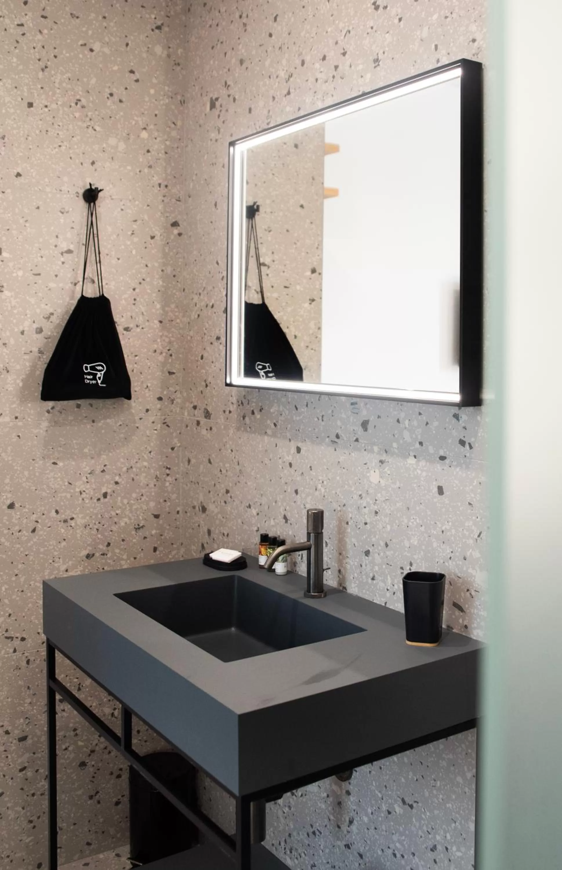 Bathroom in Lisetta Gardens Boutique & Suites