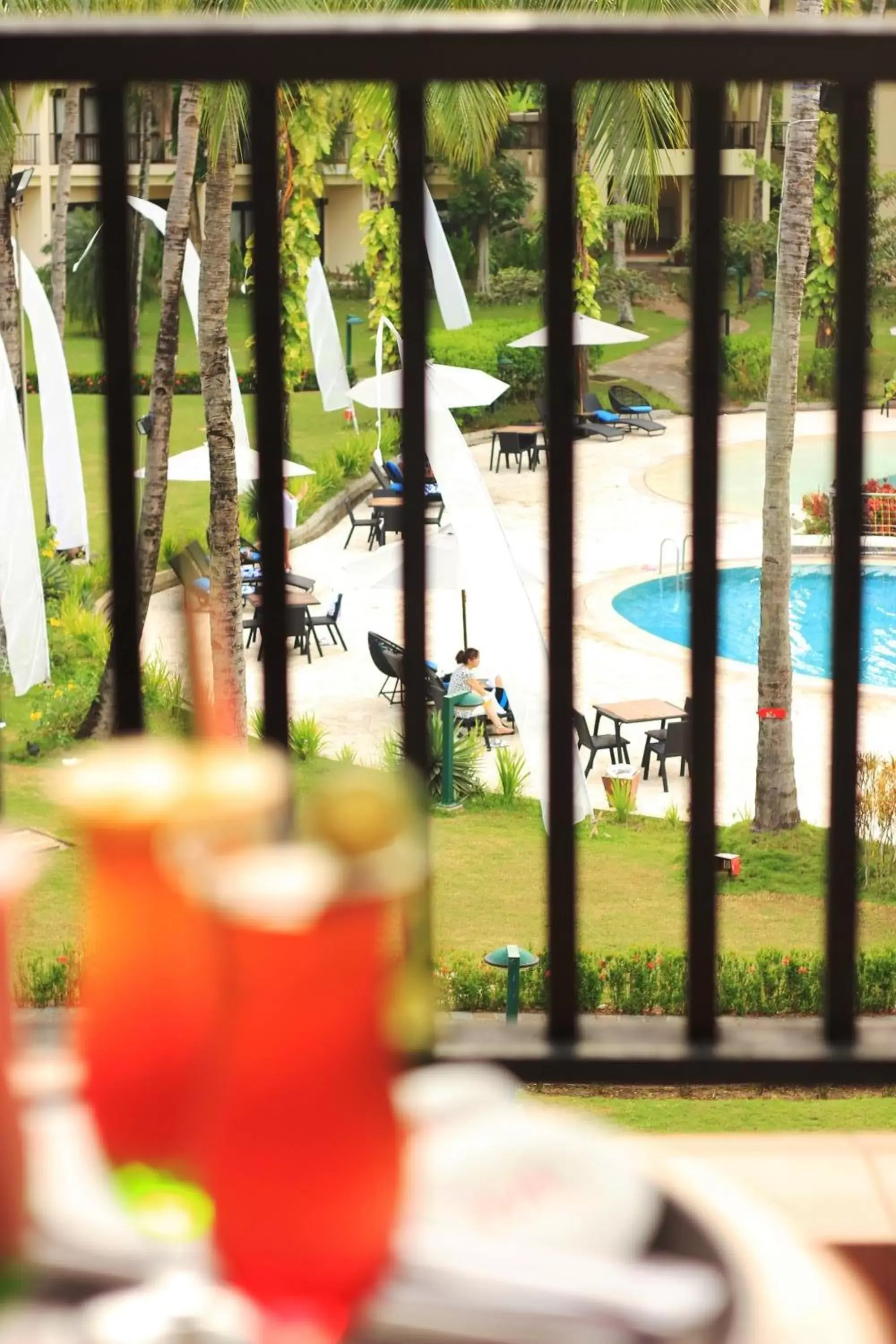 Balcony/Terrace, Pool View in Mercure Manado Tateli Resort and Convention