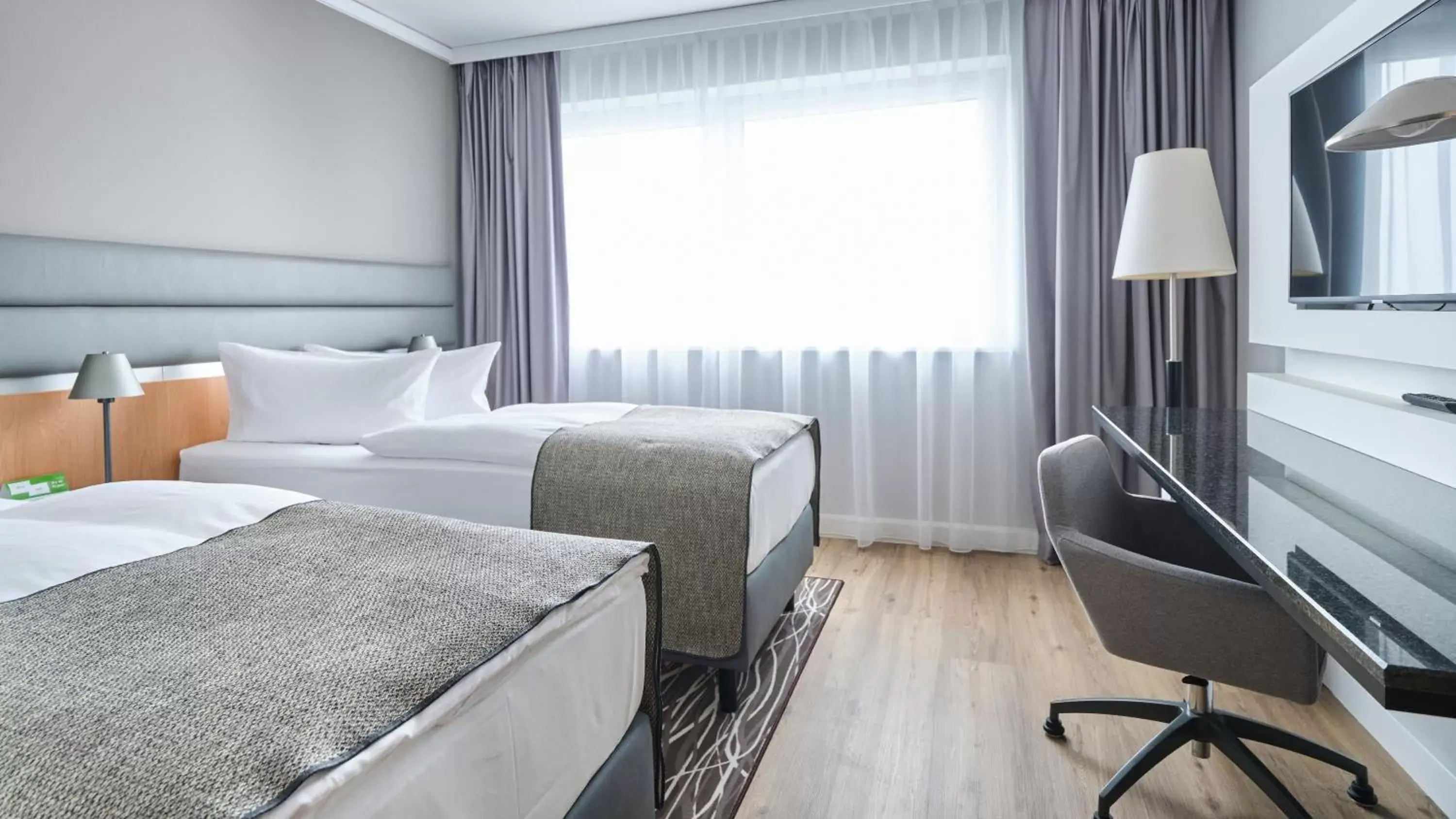 Photo of the whole room, Bed in Holiday Inn Berlin Airport - Conference Centre, an IHG Hotel