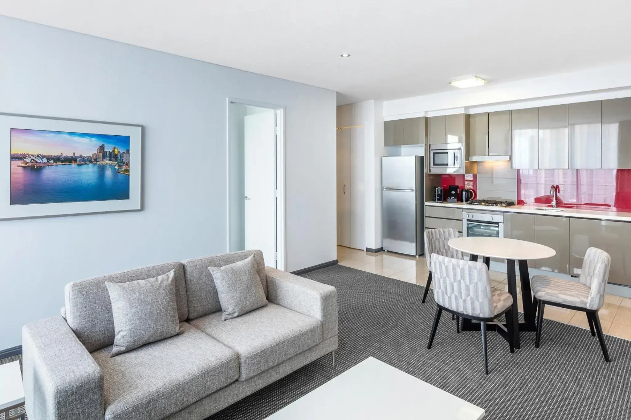 Kitchen or kitchenette, Seating Area in Meriton Suites Campbell Street, Sydney