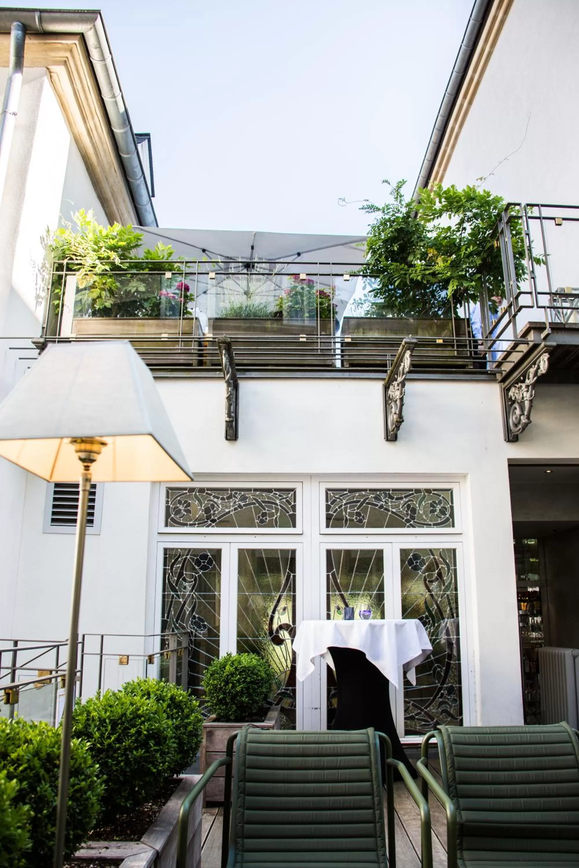 Patio in Hotel Le Place d'Armes - Relais & Châteaux