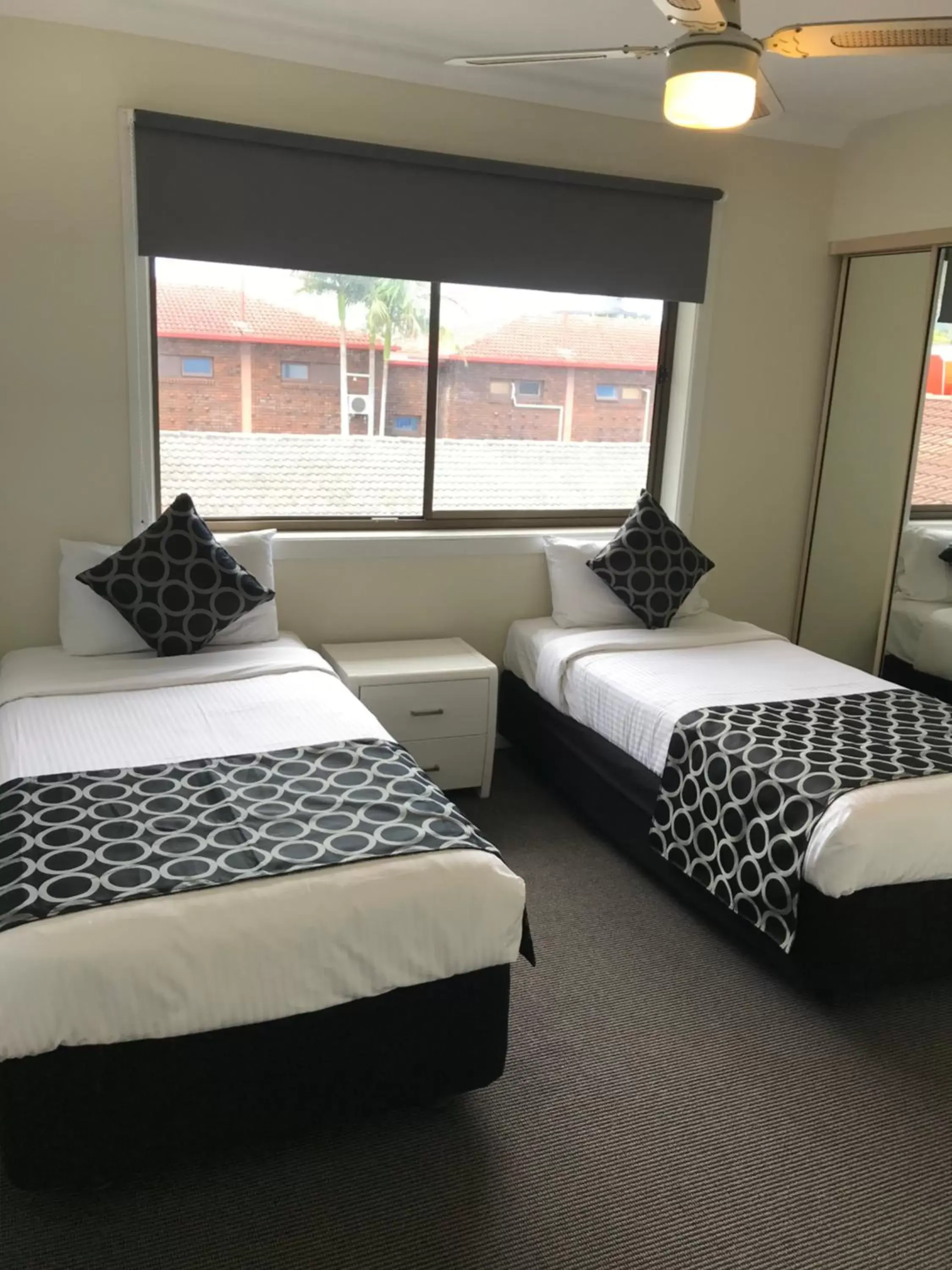 Bed in Coffs Shearwater Motel