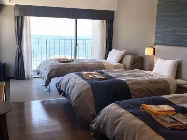 Bed in REX HOTEL Beppu