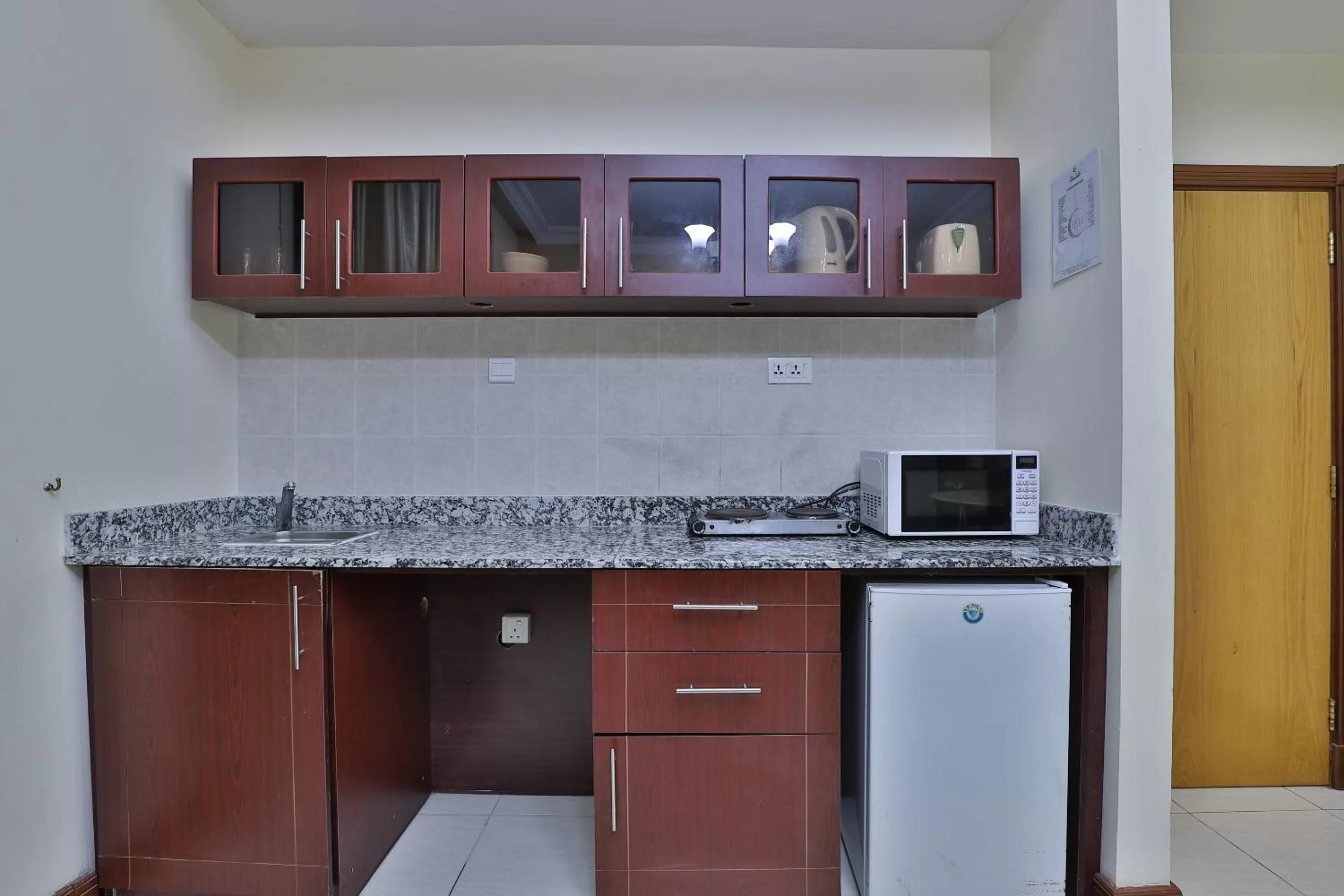 Kitchen or kitchenette in Moon Valley Hotel Apartment - Bur Dubai, Burjuman