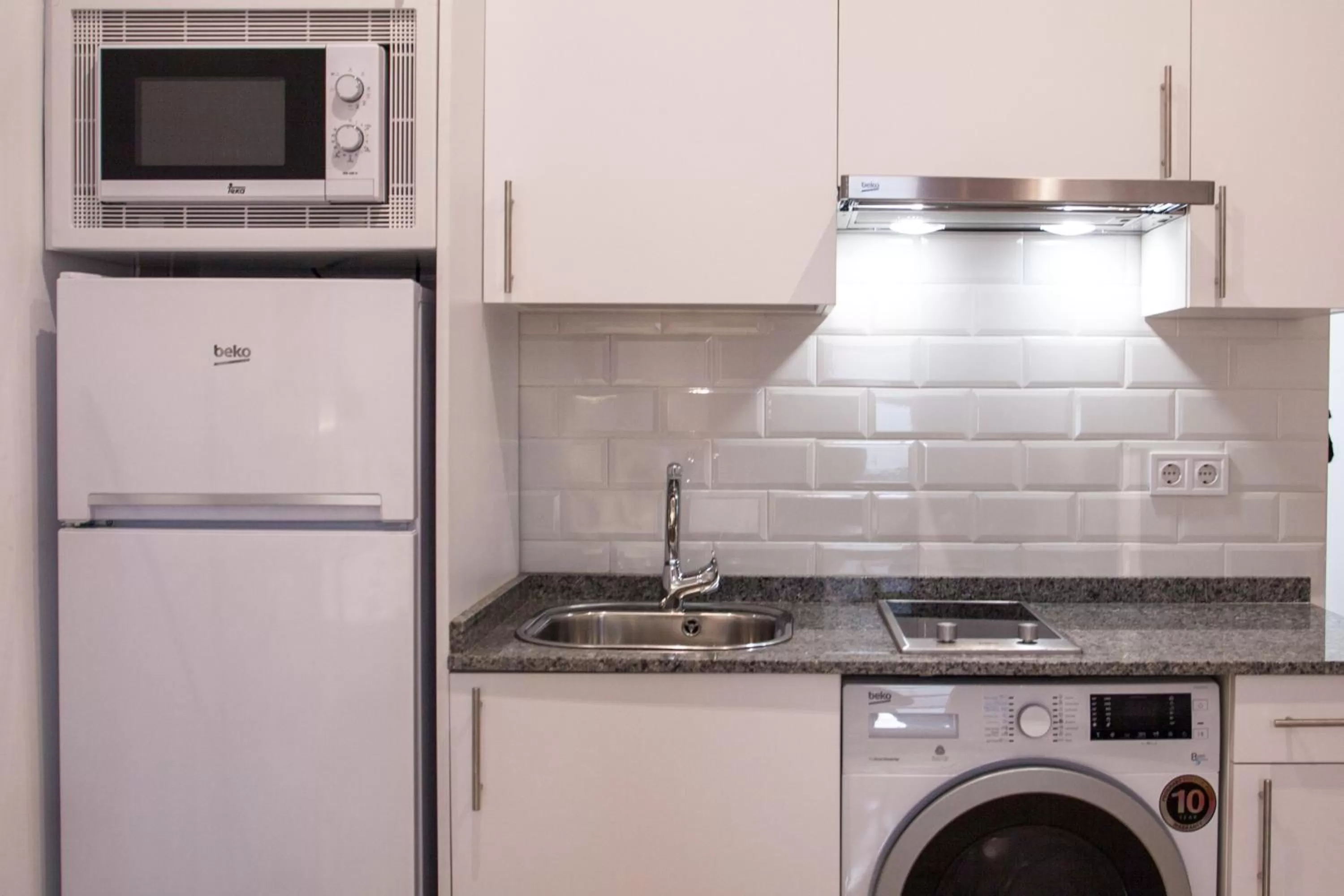 Kitchen or kitchenette in Gran Central Suites