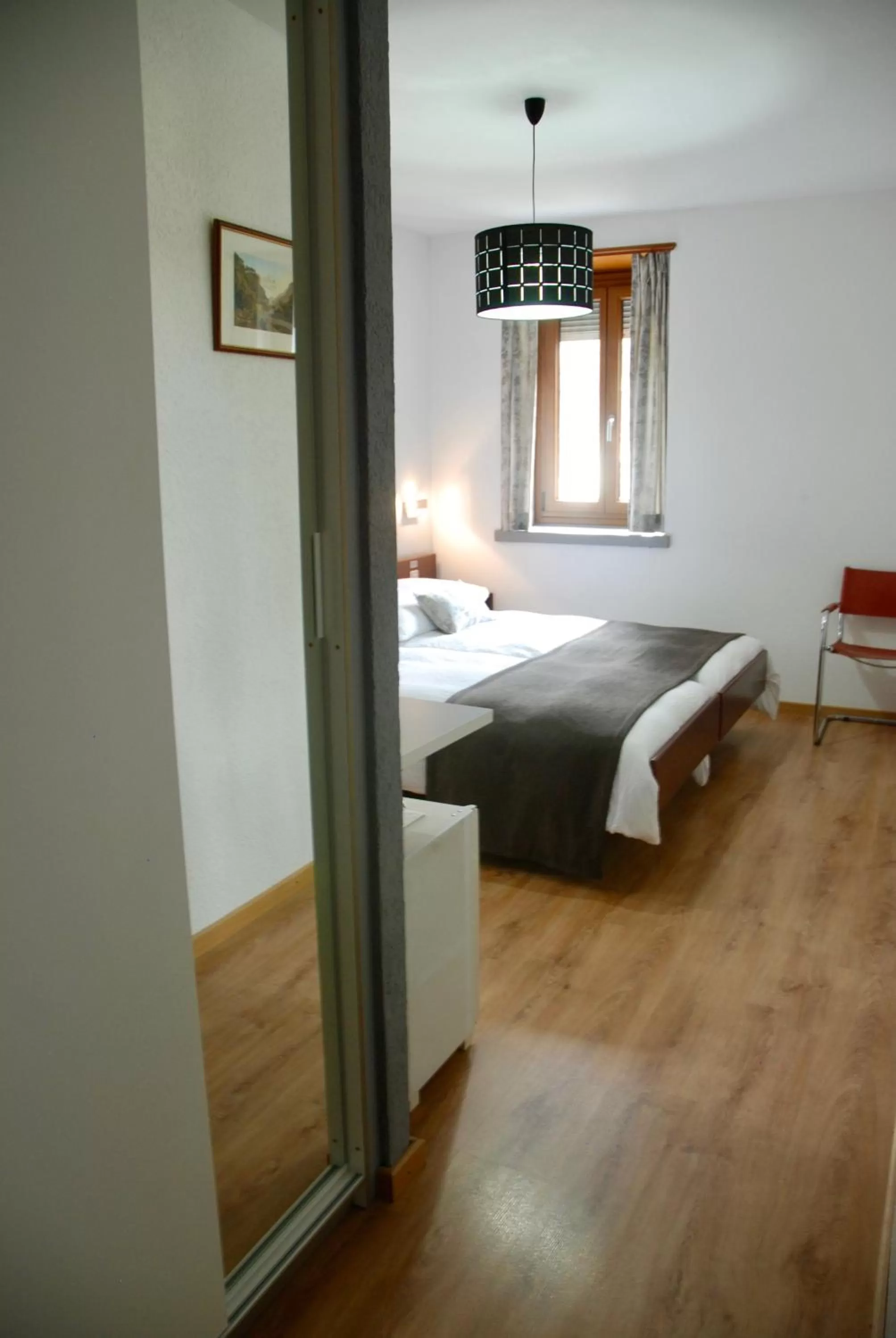 Bedroom, Bed in La Dent-du-Midi Hôtel & Restaurant